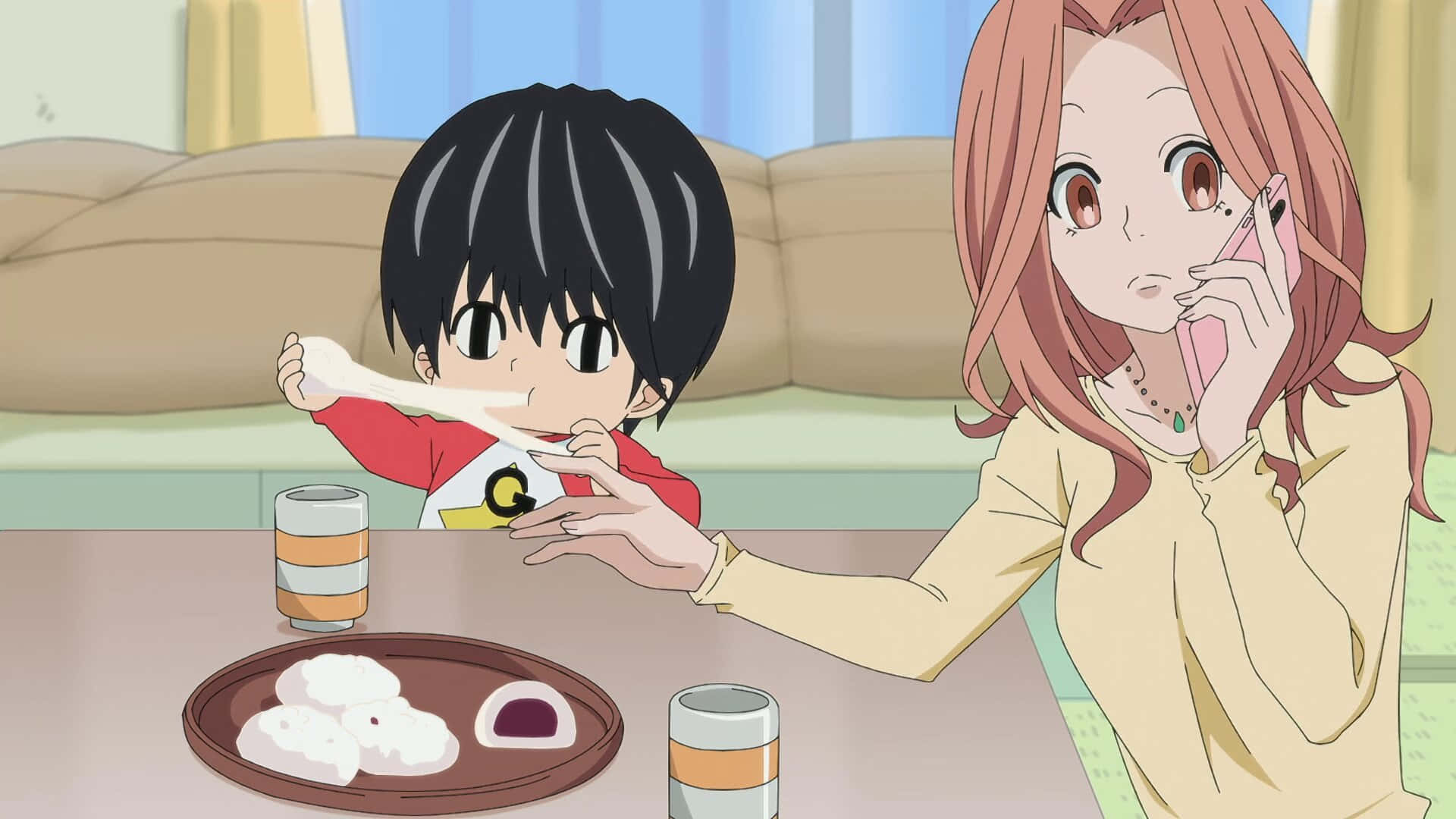A Girl Is Sitting At A Table With A Boy And A Plate Of Food