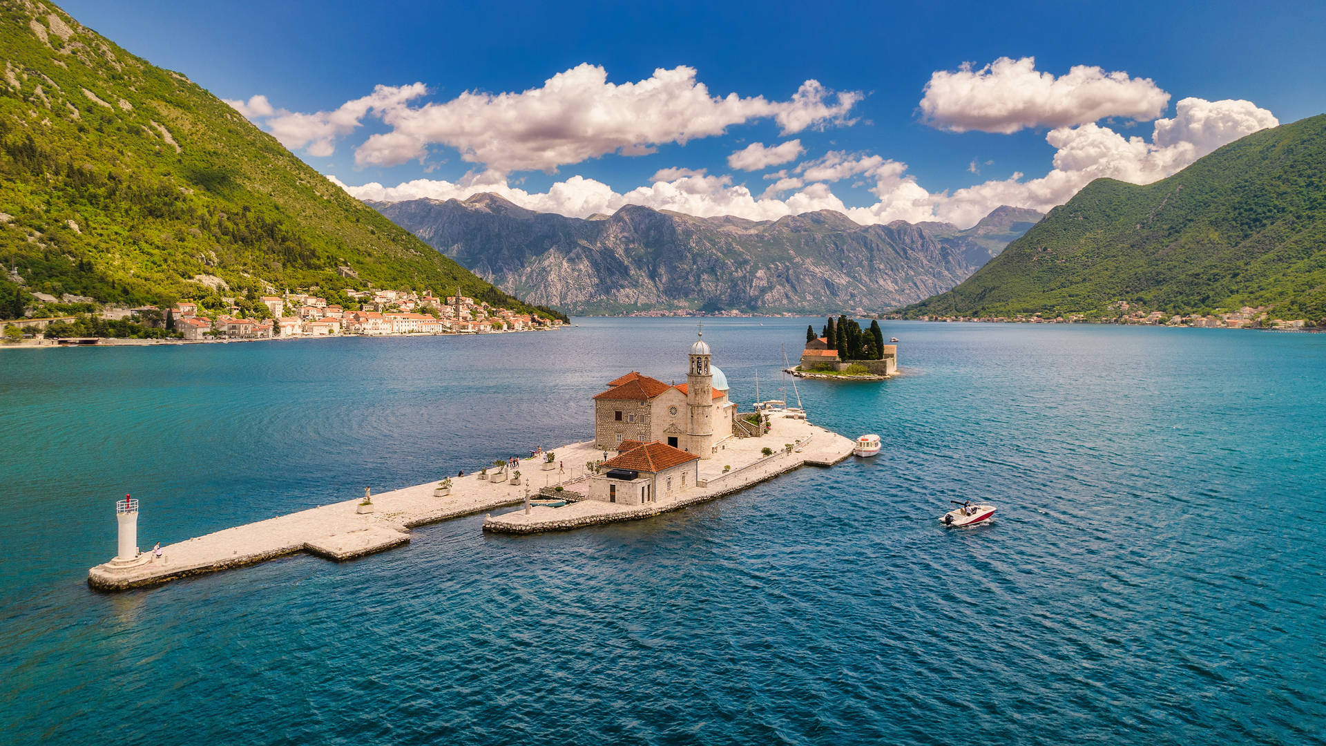 Breathtaking View Of The Iconic Our Lady Of The Rocks In Kotor Bay. Wallpaper