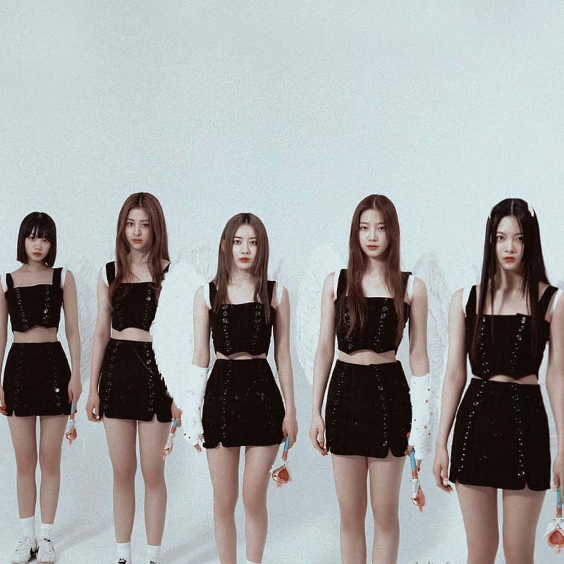 Kpop_ Group_ In_ Black_ Outfits Wallpaper