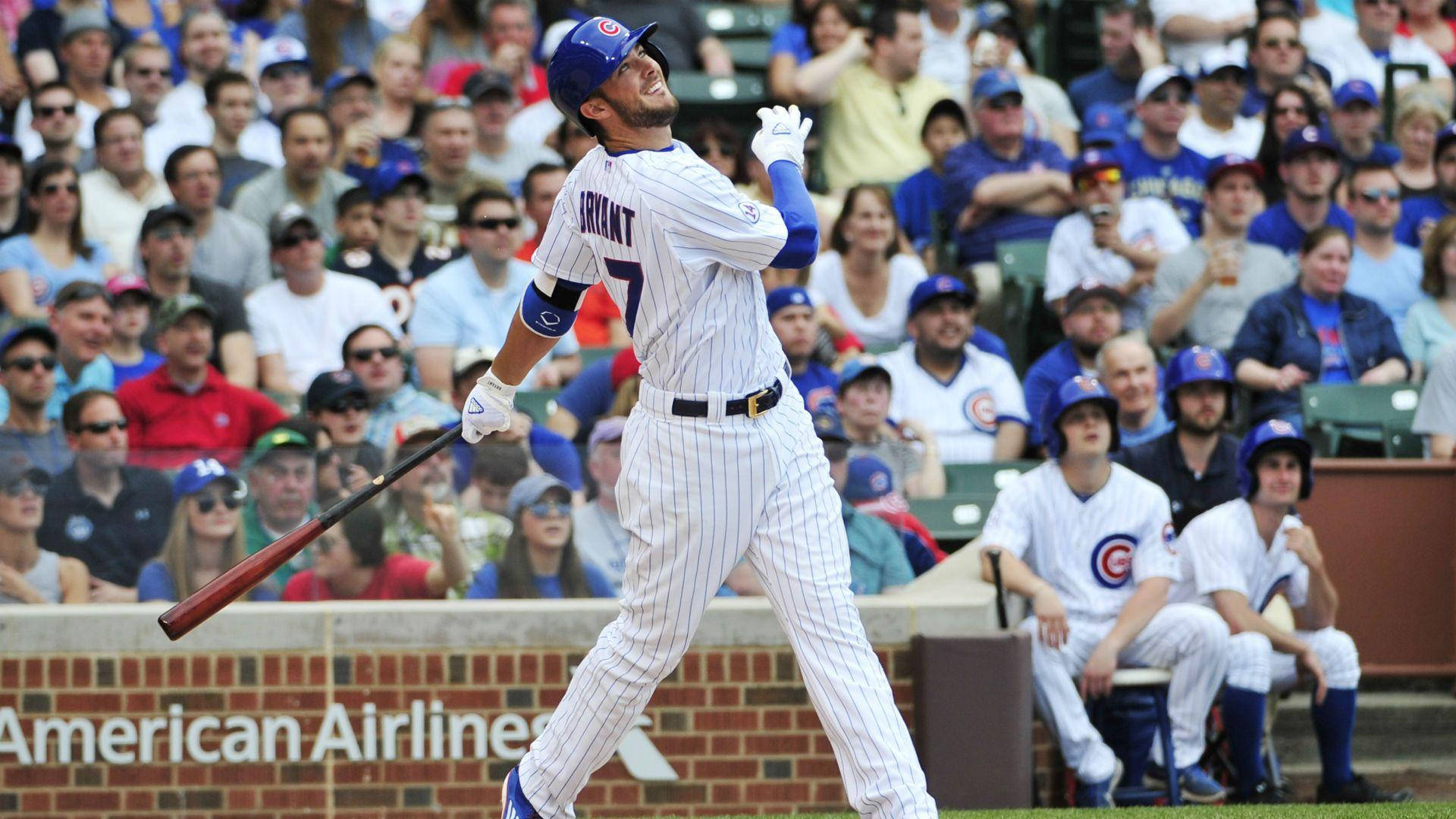 Download Kris Bryant Fist Bumping With Rizzo Wallpaper