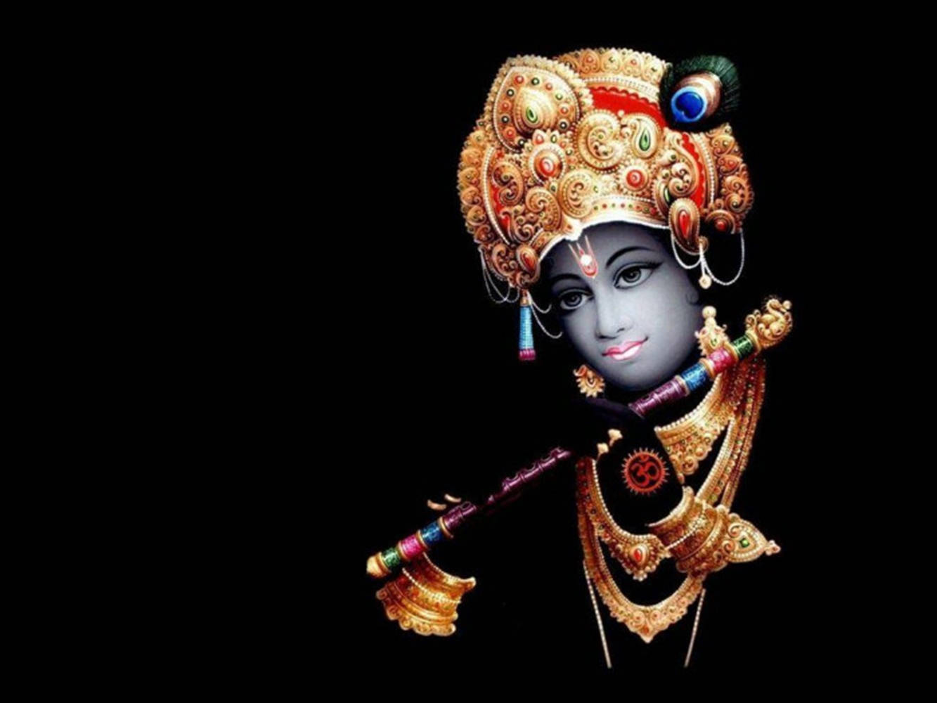 Statuadi Krishna Squisita Per Celebrare Il Janmashtami Sfondo