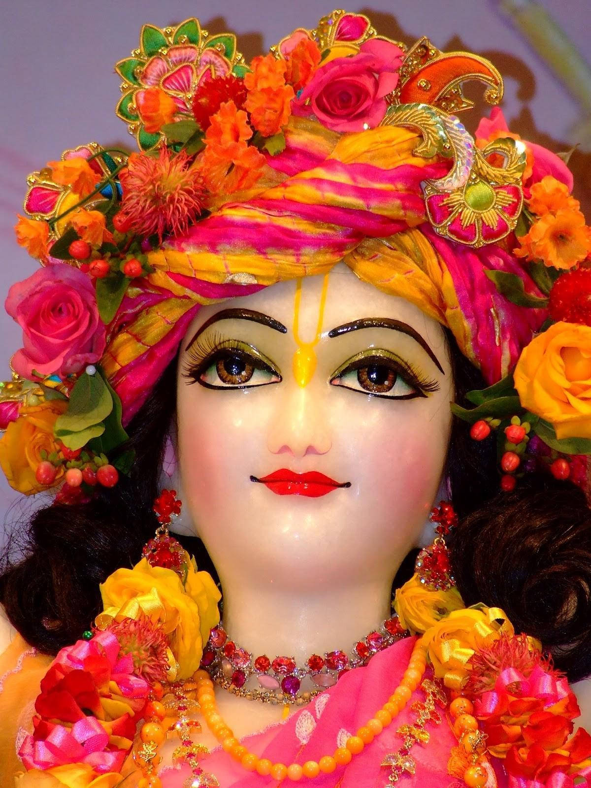 Download Krishna Ji In Orange And Pink Wallpaper 