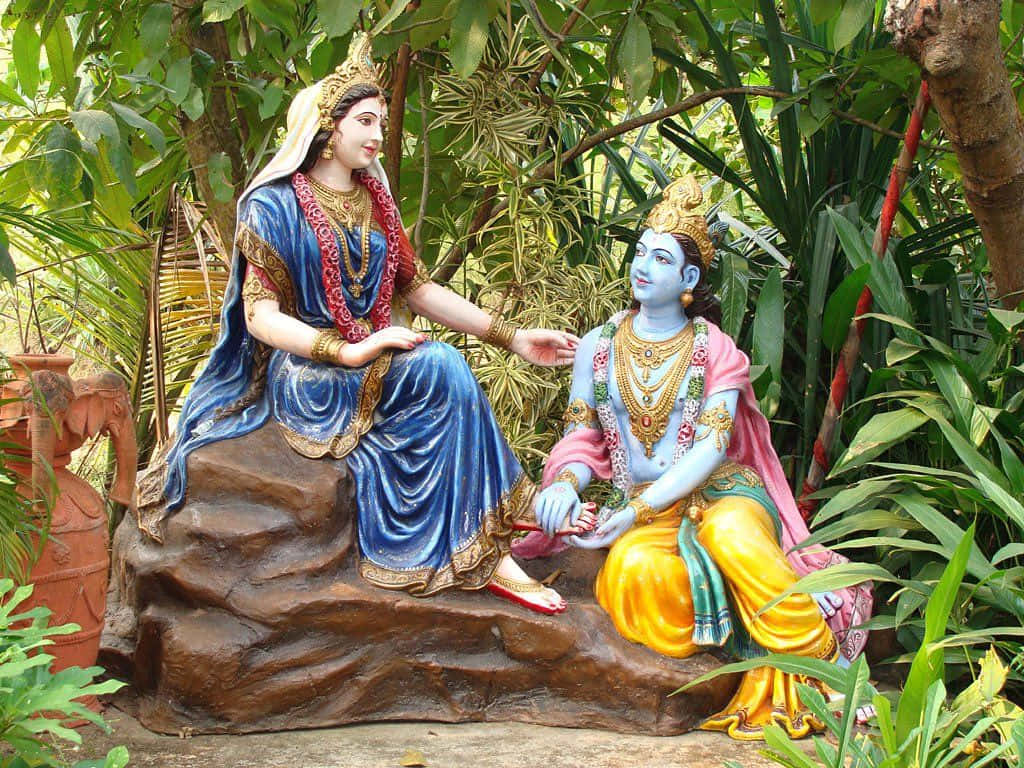 Immaginedi Statue Di Krishna E Radha Nella Foresta