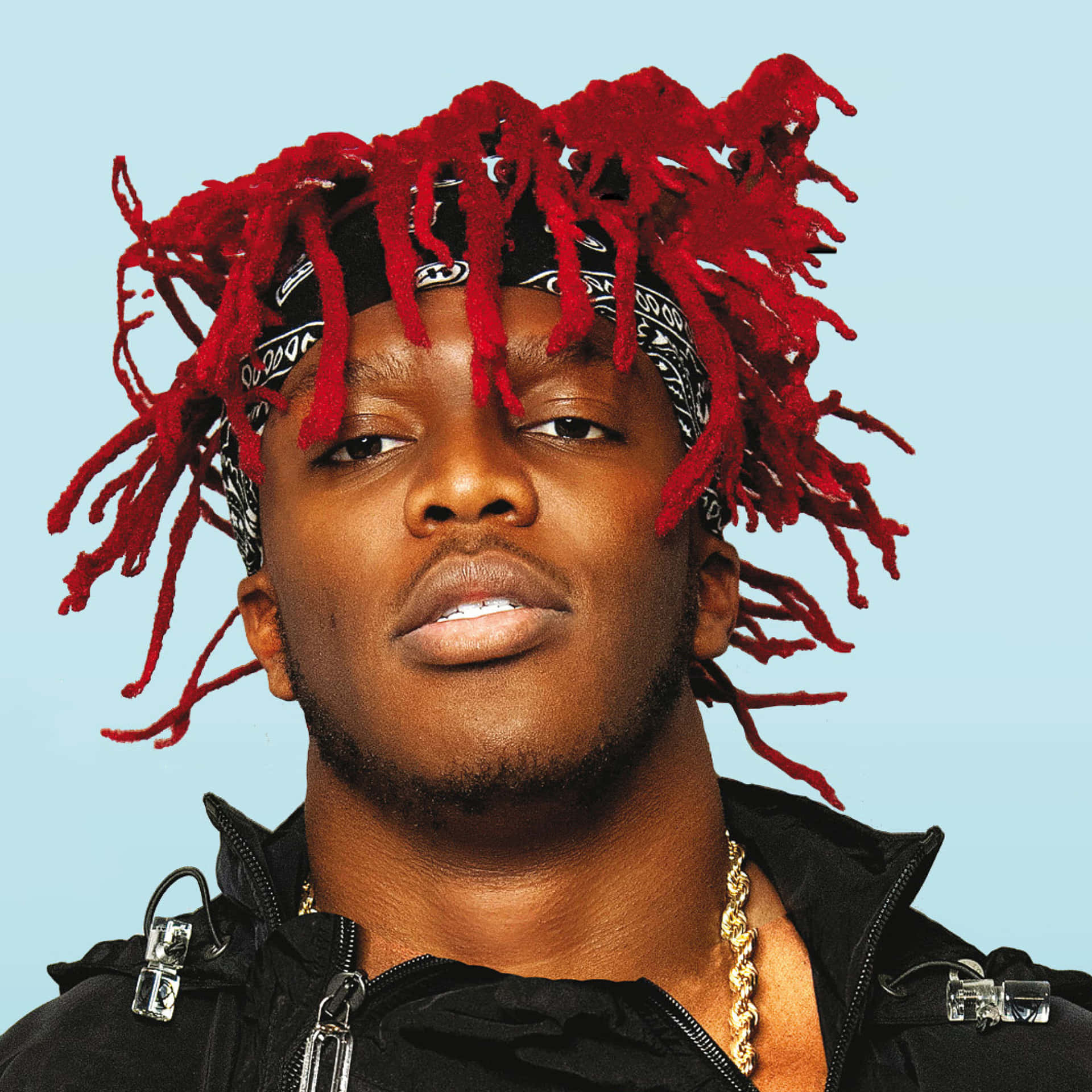 A Man With Red Dreadlocks And A Black Jacket Wallpaper