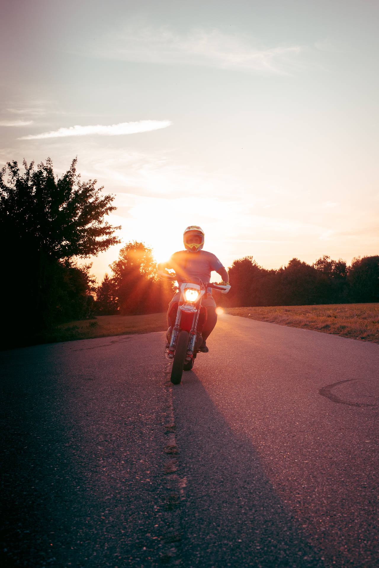 Ktm Bike Rider At Sunset Wallpaper