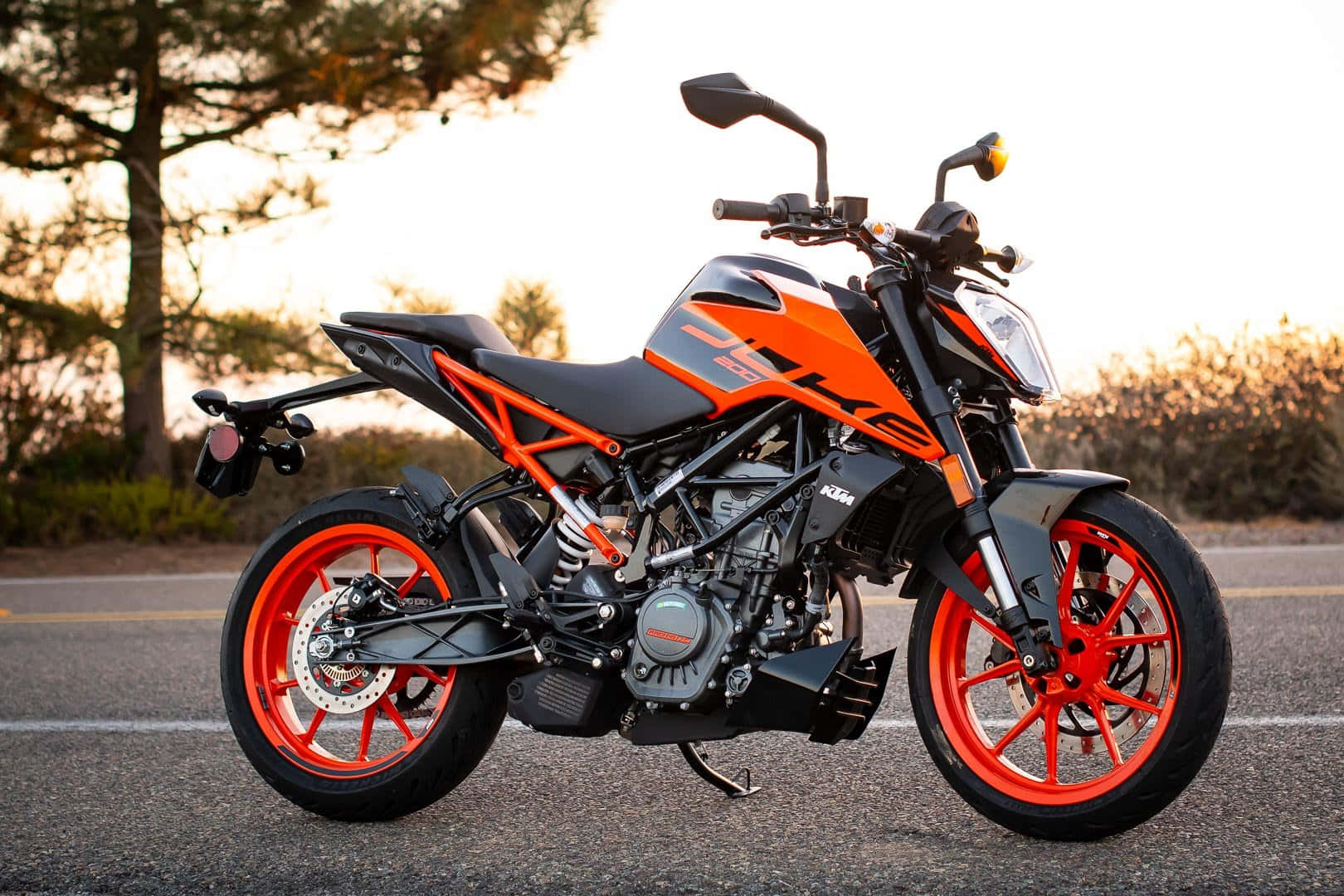 Ktm Duke 200 Motorcycle With Sunset Sky Picture