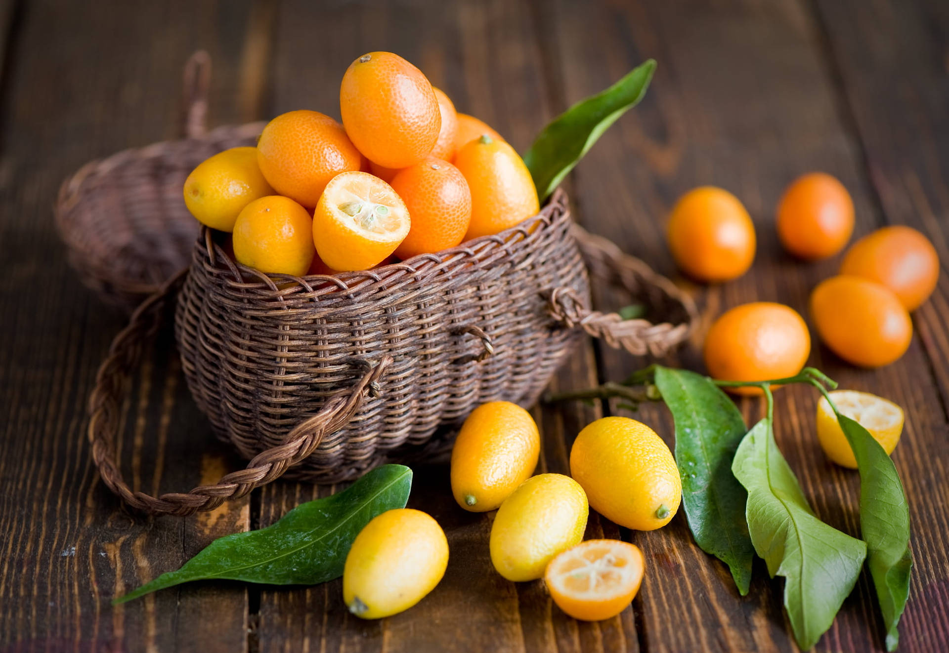 Frutasde Kumquat En Una Canasta. Fondo de pantalla