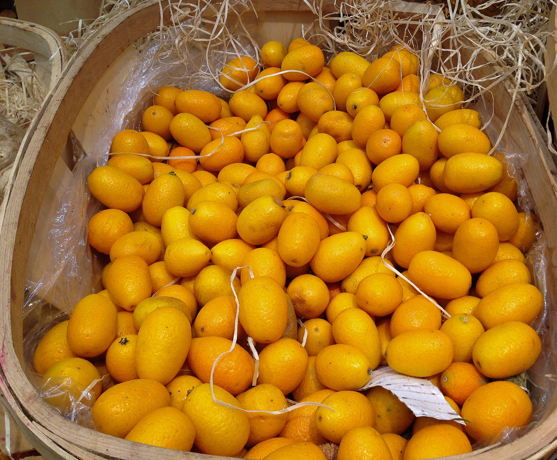 Exhibiciónde Frutas De Kumquat Con Toma De Ángulo Alto Fondo de pantalla