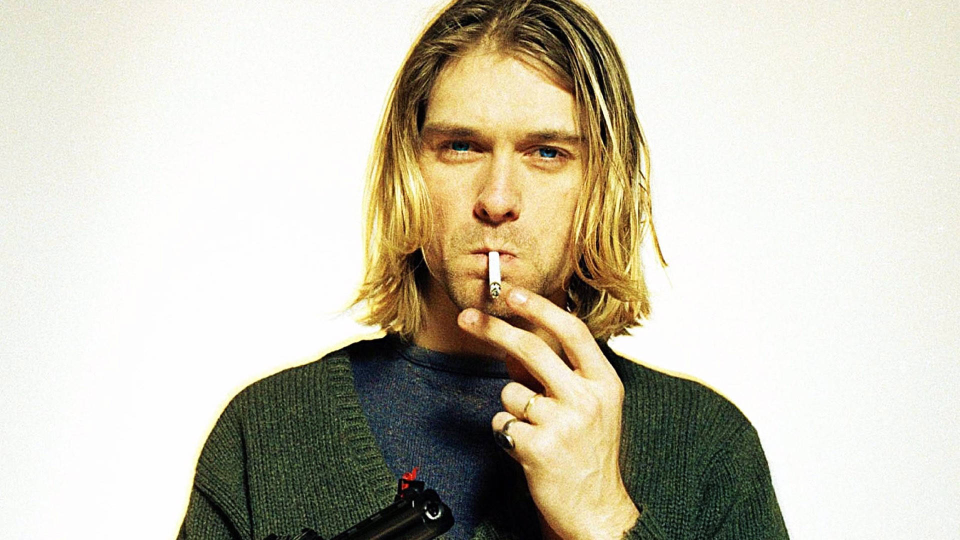 Tapet - Kurt Cobain, der ryger med en pistol tapet. Wallpaper