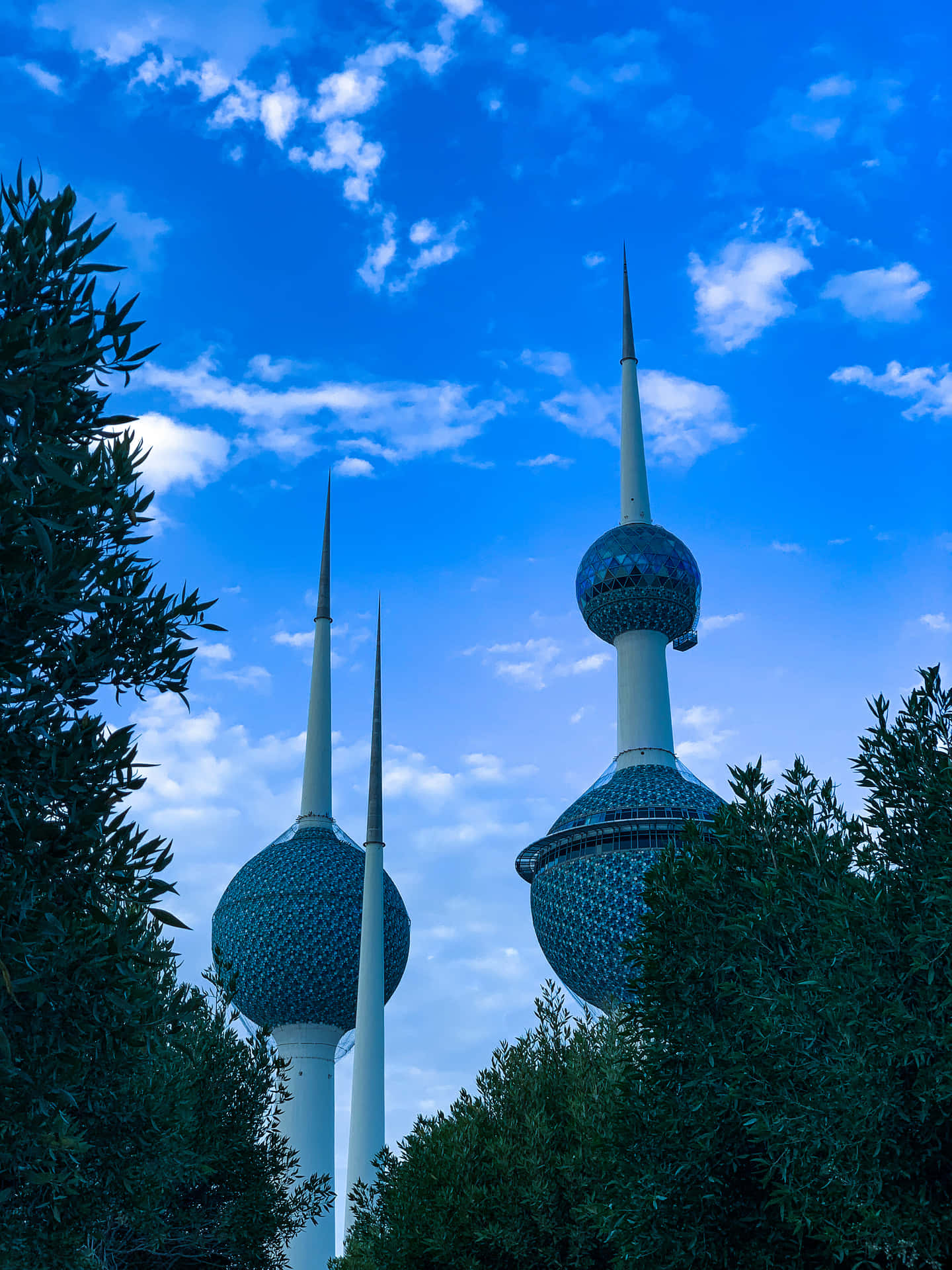 Stunning View of Kuwait Towers Against Blue Sky Wallpaper