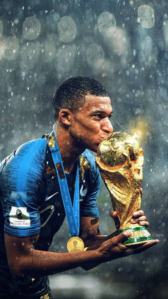 Kylian Mbappe Kissing World Cup Trophy