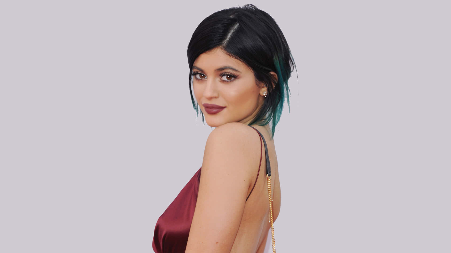 Kyliejenner Stupisce In Un Favoloso Outfit Rosa. Sfondo