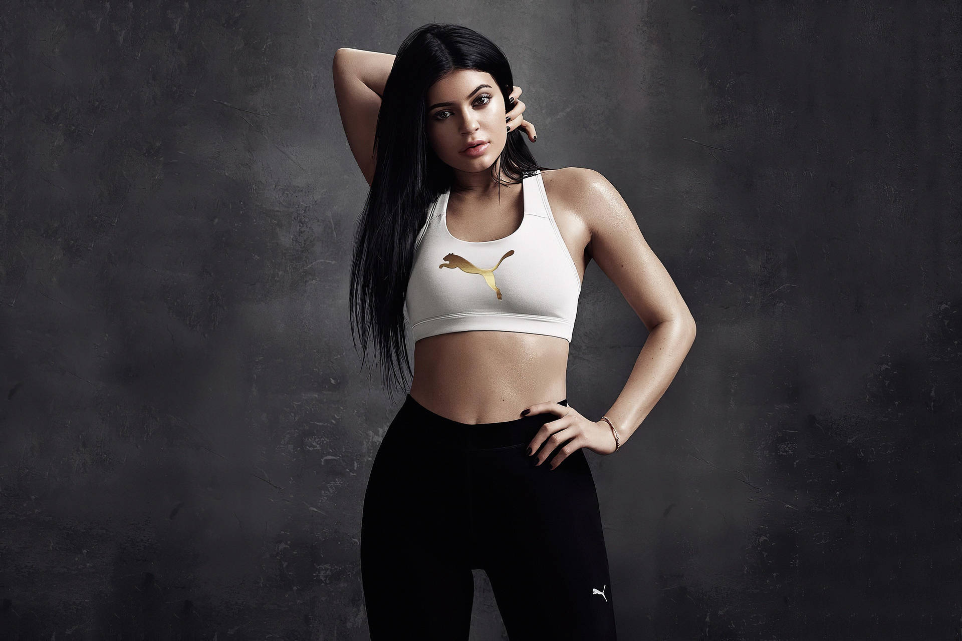 Download Kylie Jenner In White Black Puma Wallpaper 