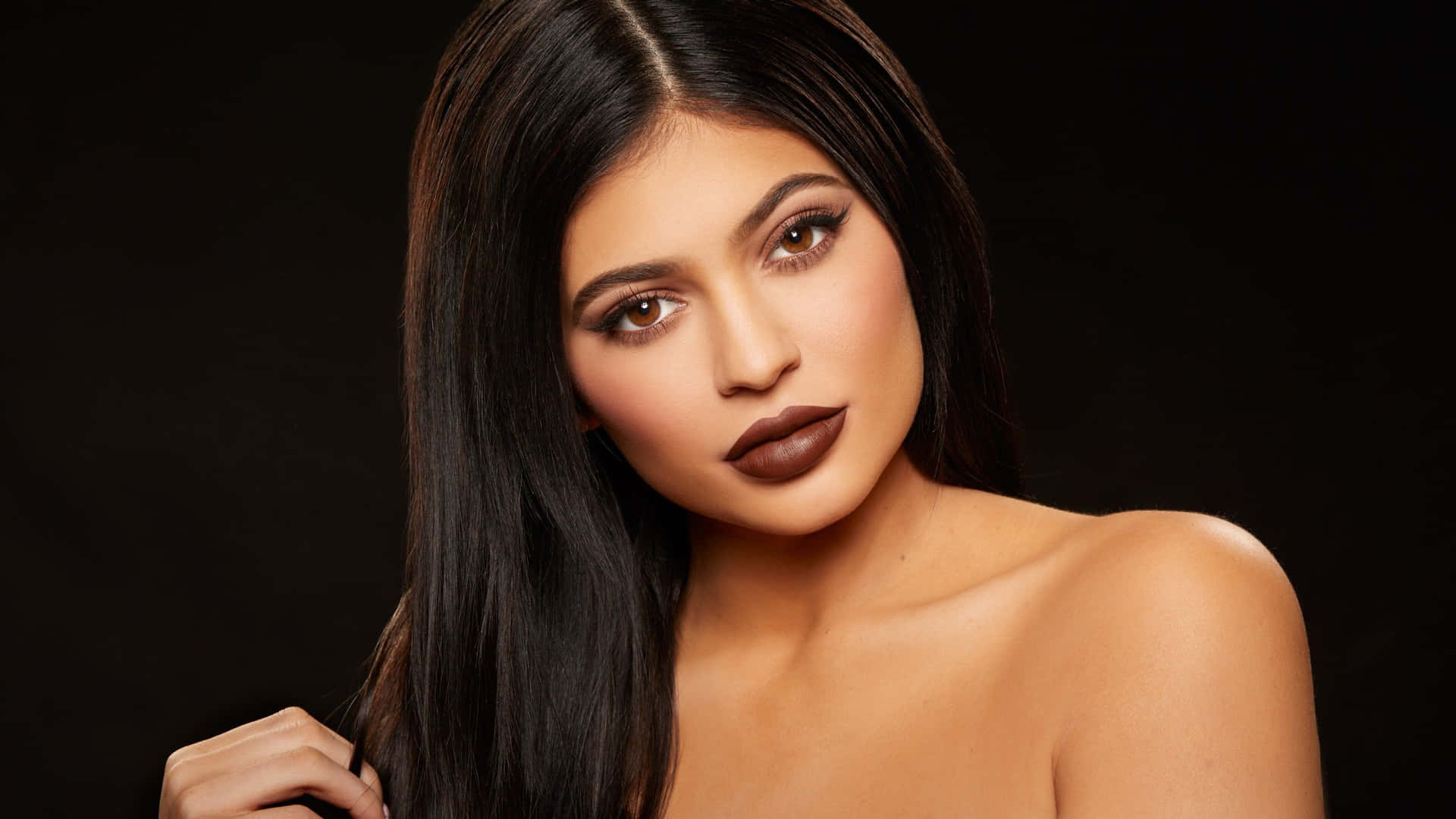 Kylie Jenner flaunting brown hair and a some serious style