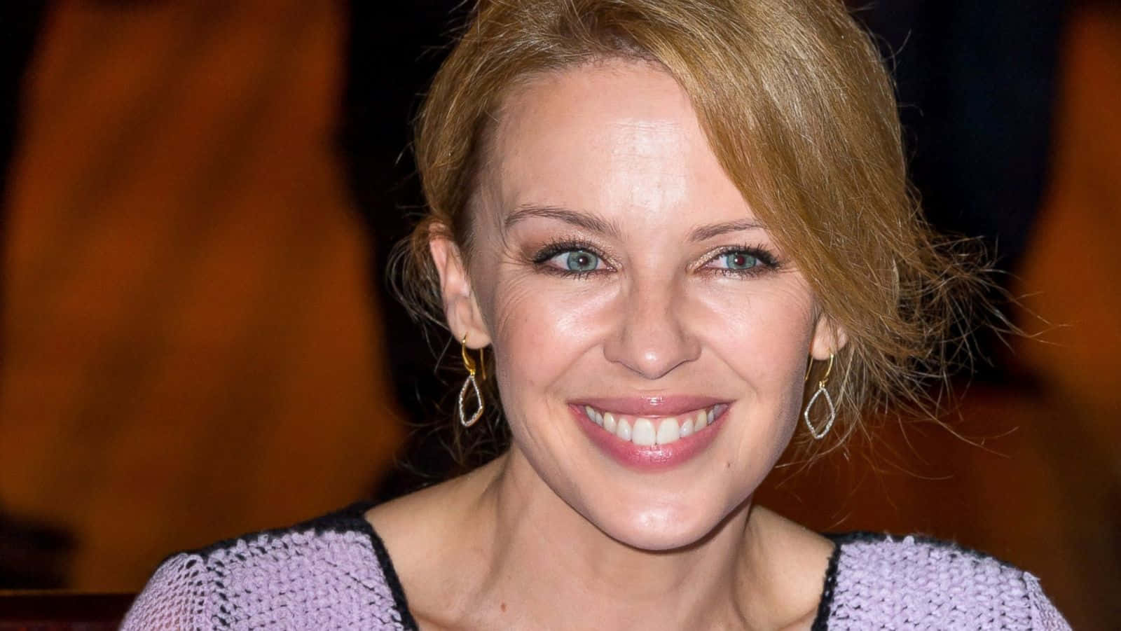 Kylie Minogue Smiling Portrait Wallpaper