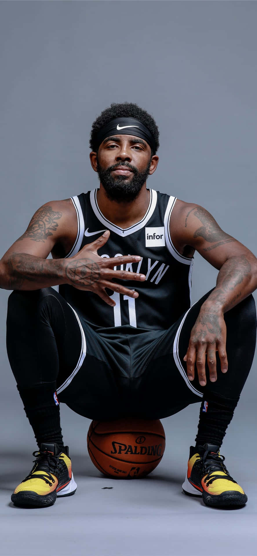 Kyrie Irving (#11) takes the court with the Brooklyn Nets Wallpaper