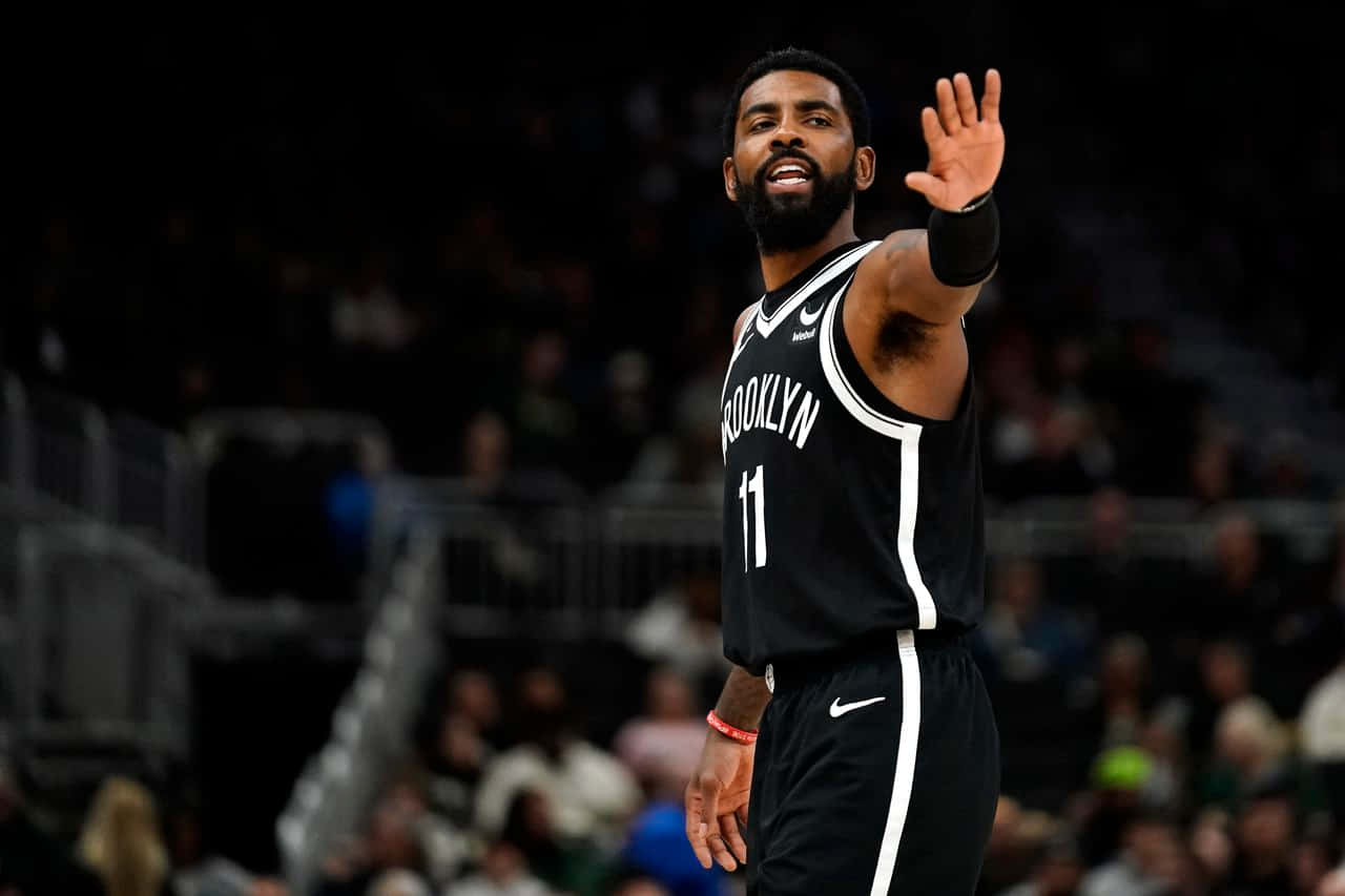 The Brooklyn Nets’ Kyrie Irving, Ready for Action Wallpaper