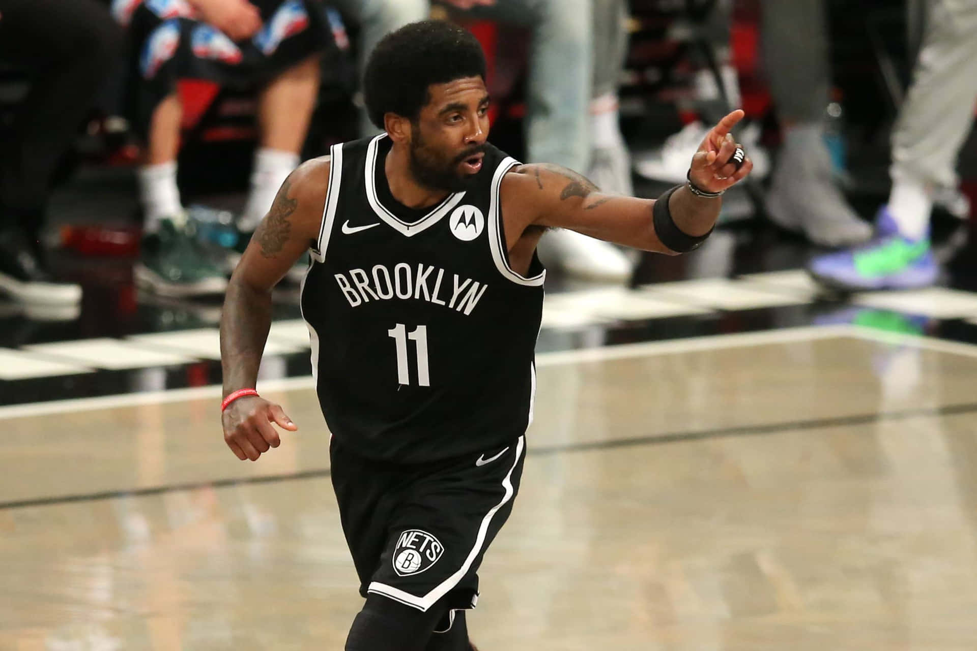 Kyrie Irving i aktion for Brooklyn Nets. Wallpaper