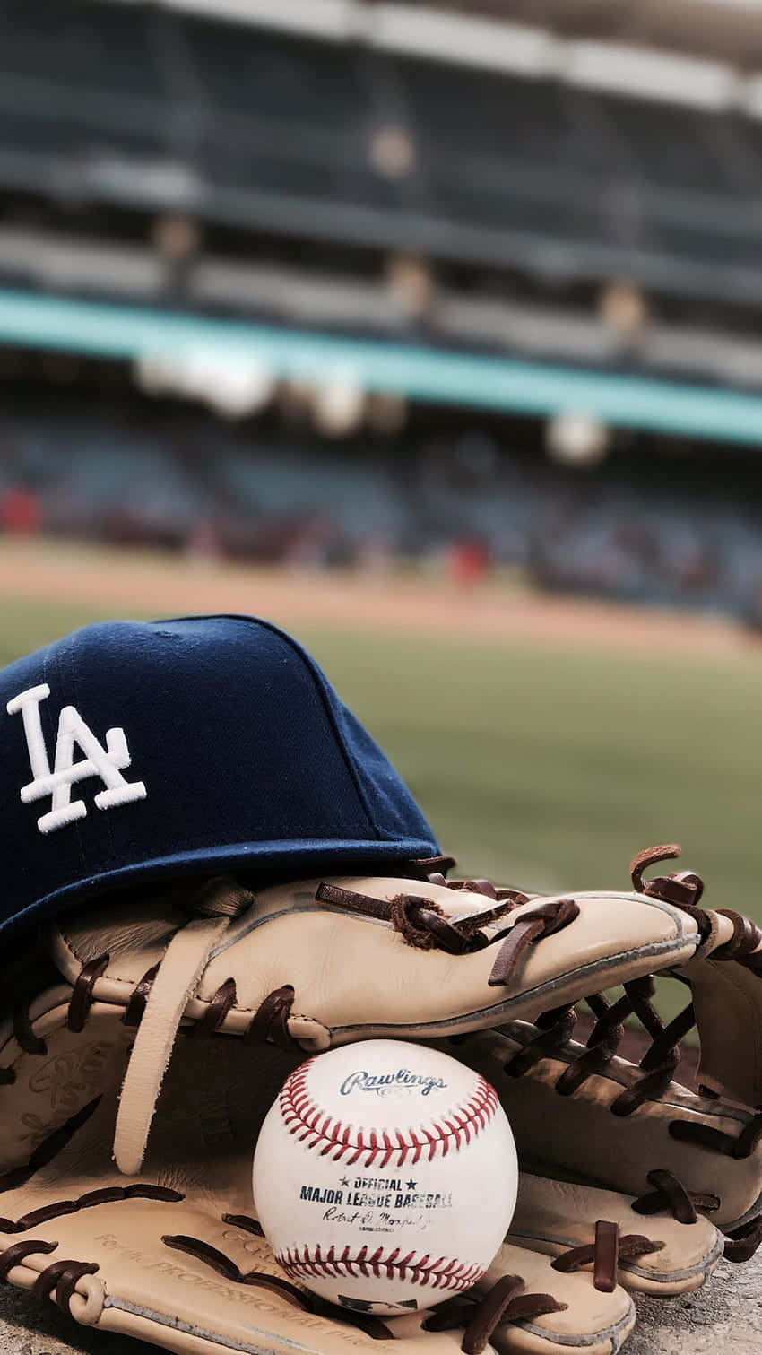 L A Dodgers Capand Gloveat Stadium Wallpaper