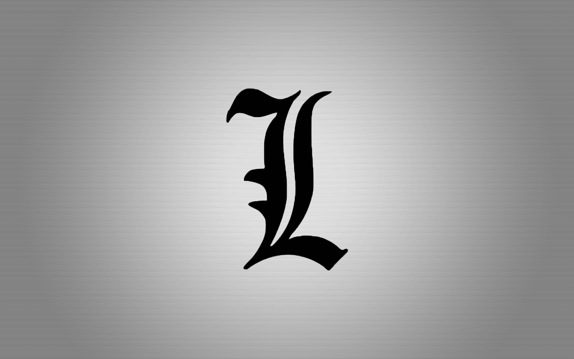A Black And White Letter L On A Gray Background