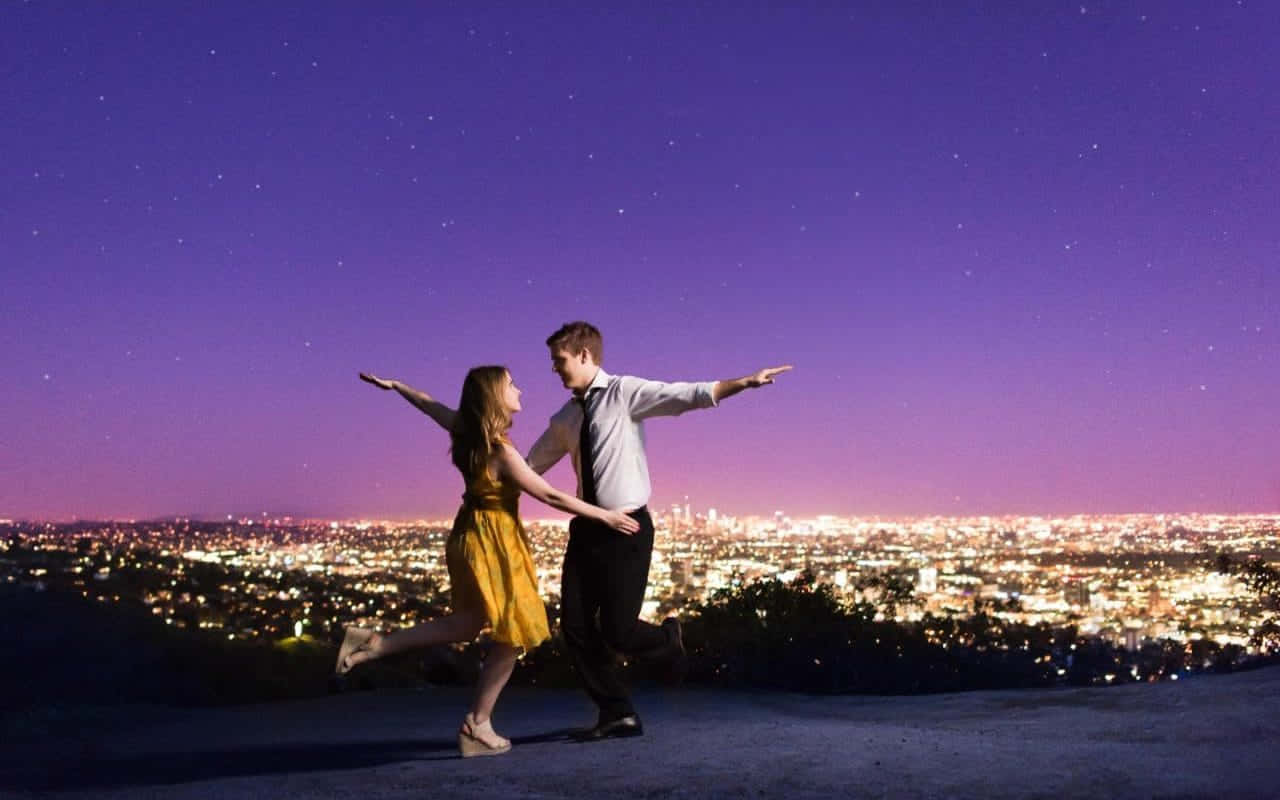 Ryangosling Og Emma Stone I Den Academy Award-vindende Film, La La Land. Wallpaper
