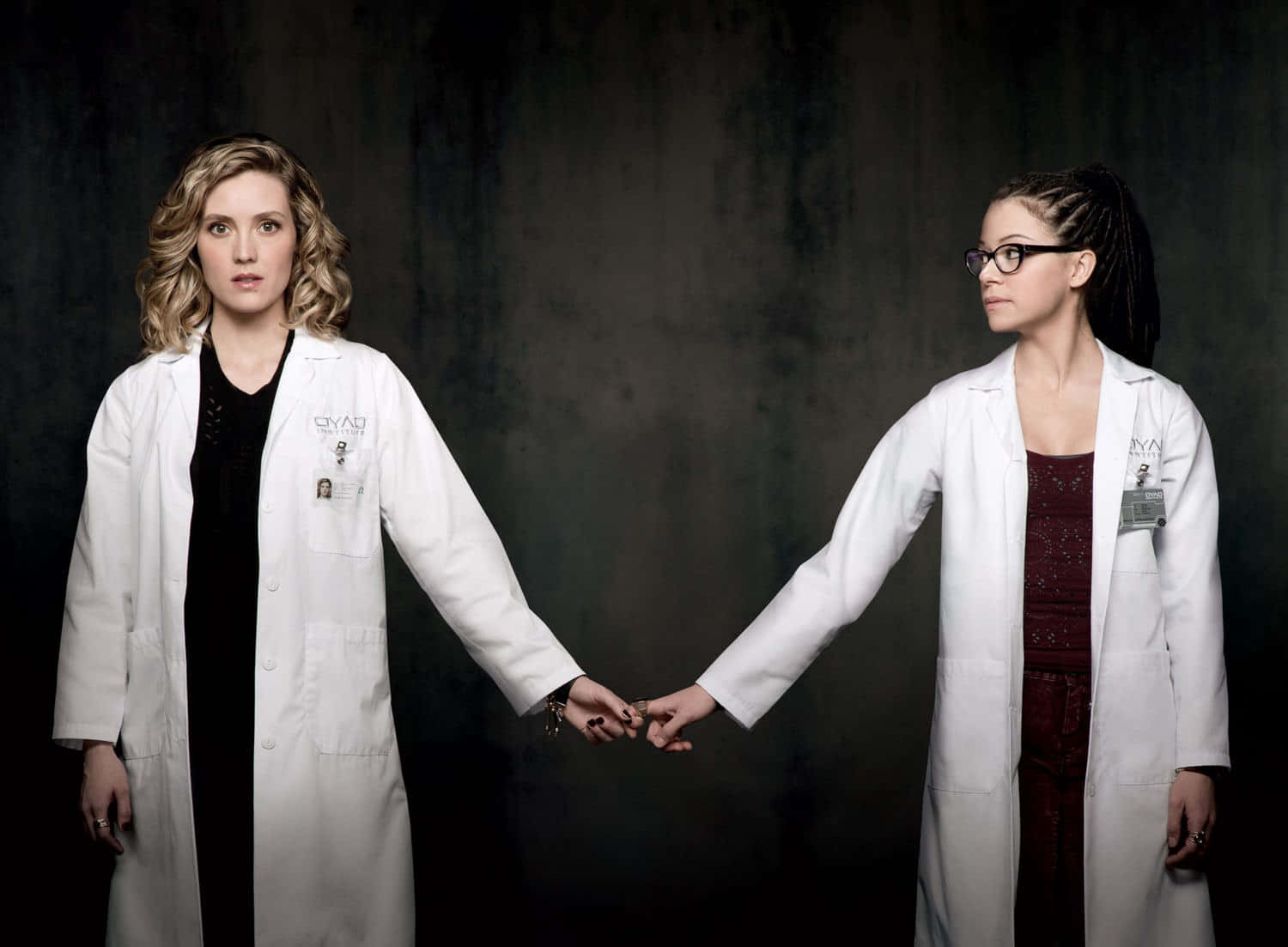 Lab Coat Professionals Holding Hands Wallpaper