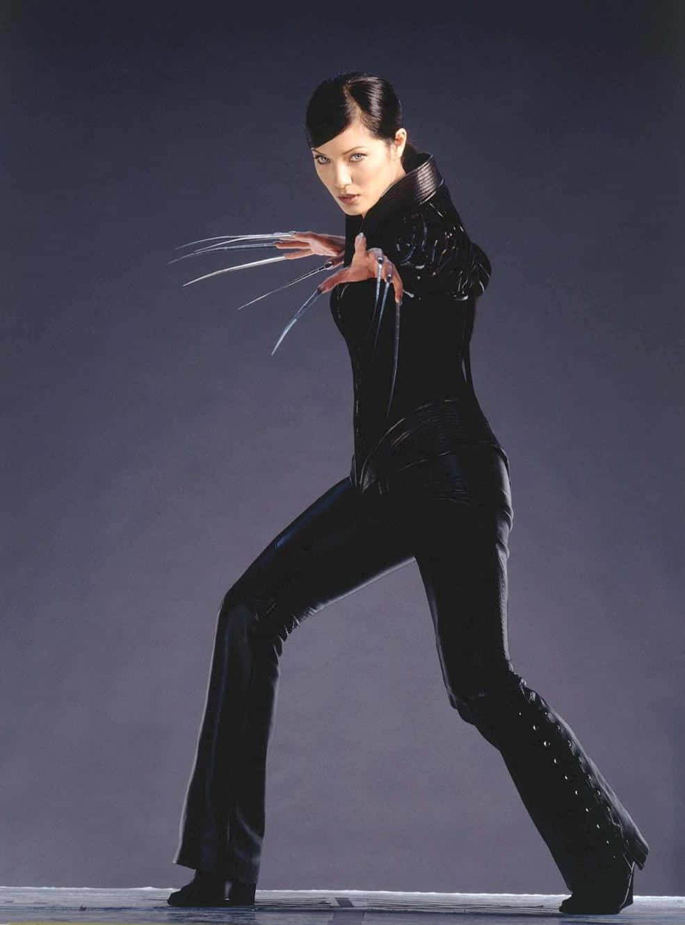 Lady Deathstrike in her iconic pose Wallpaper