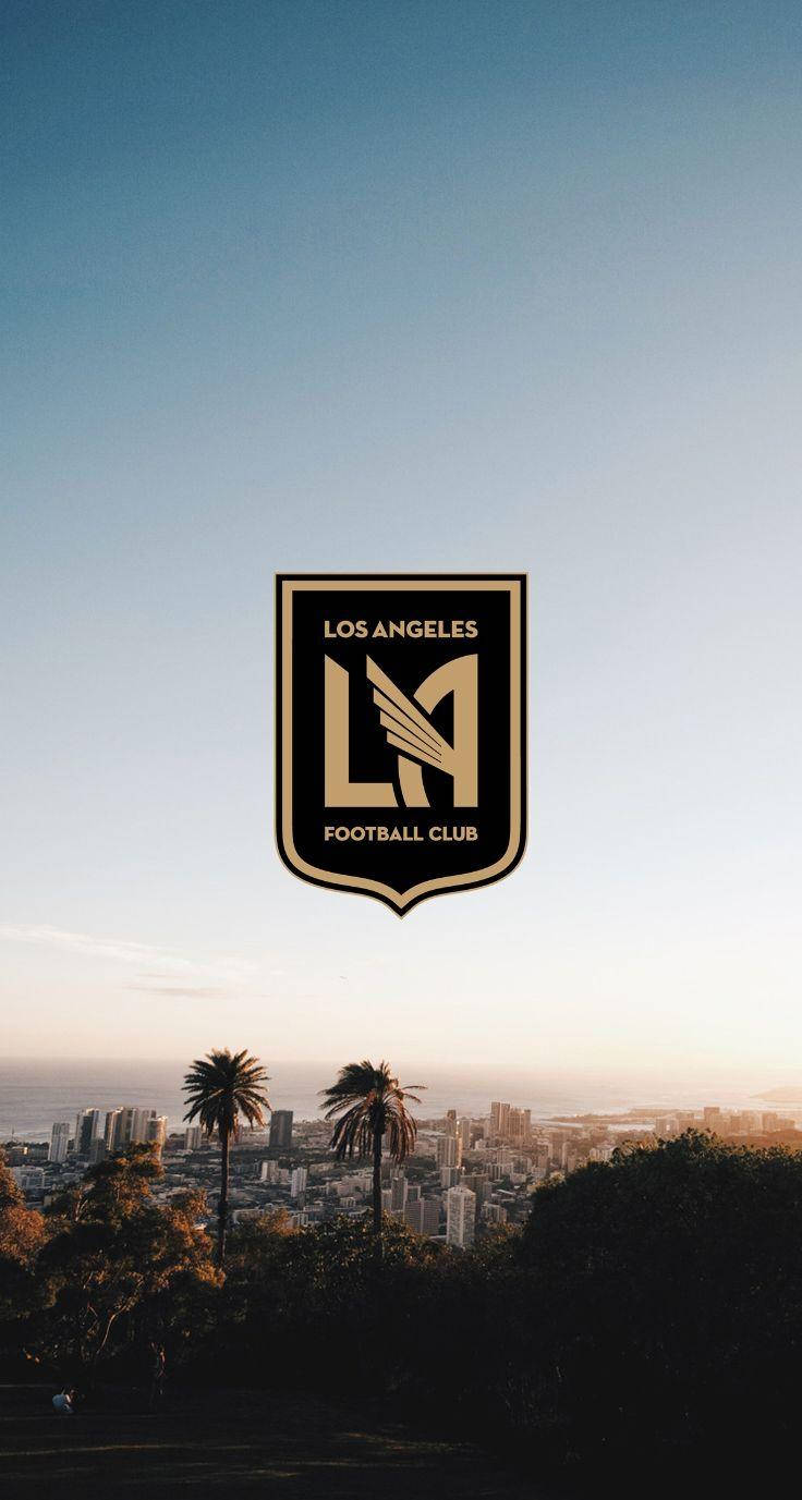 Lafc Logo With Backdrop Of The City Wallpaper