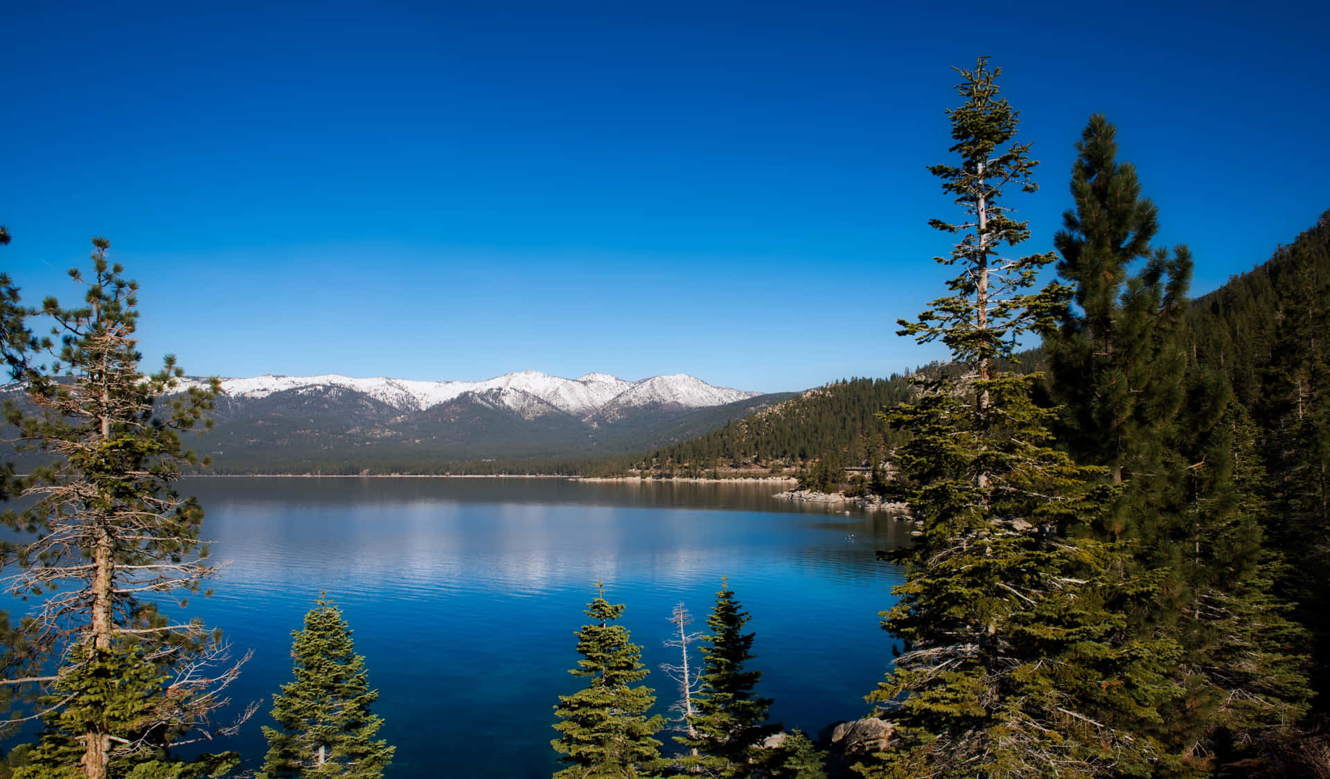 "Admire the stunning lake views at Lake Tahoe in California." Wallpaper