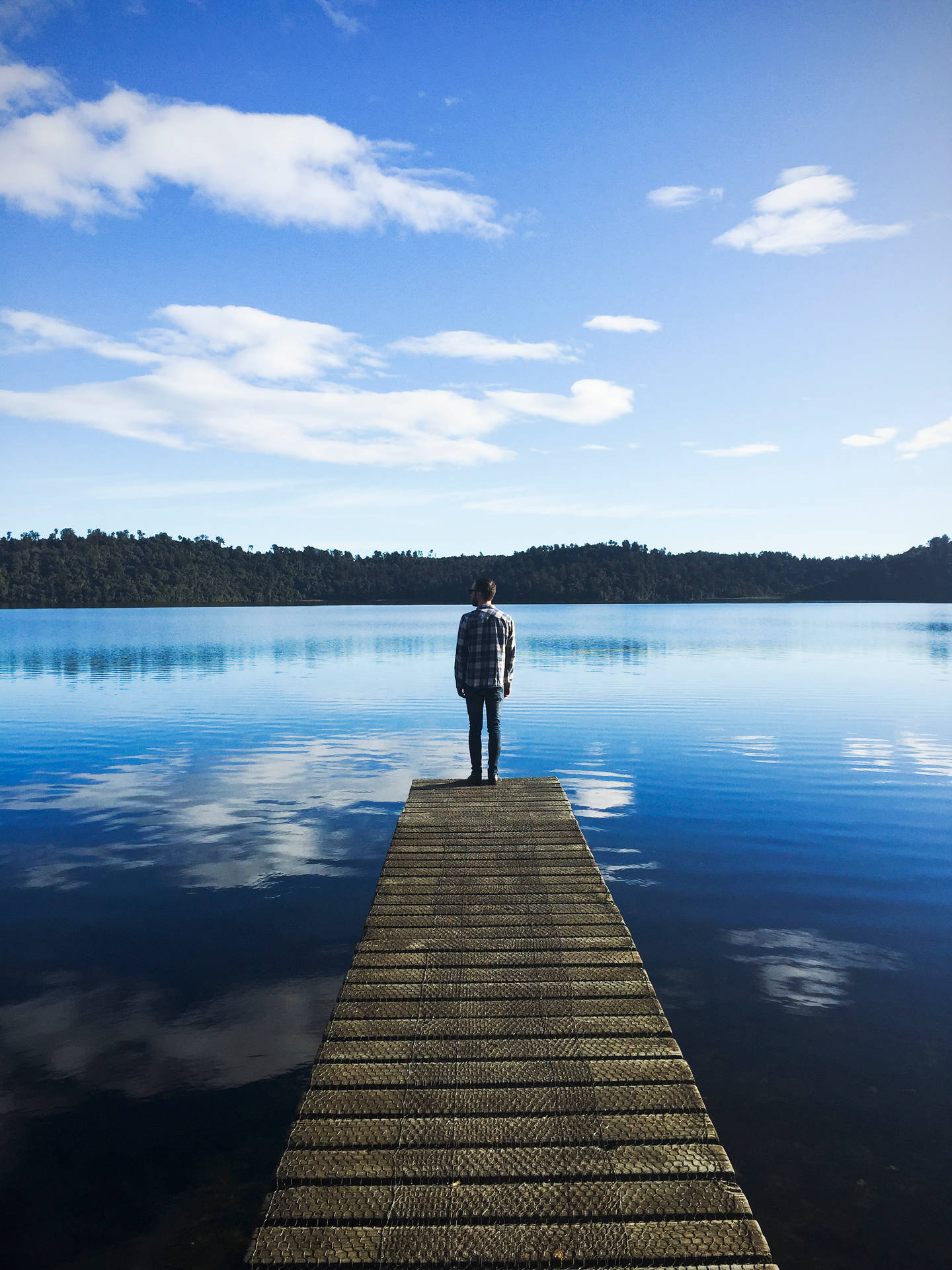 Lake With A Man Standing Wallpaper