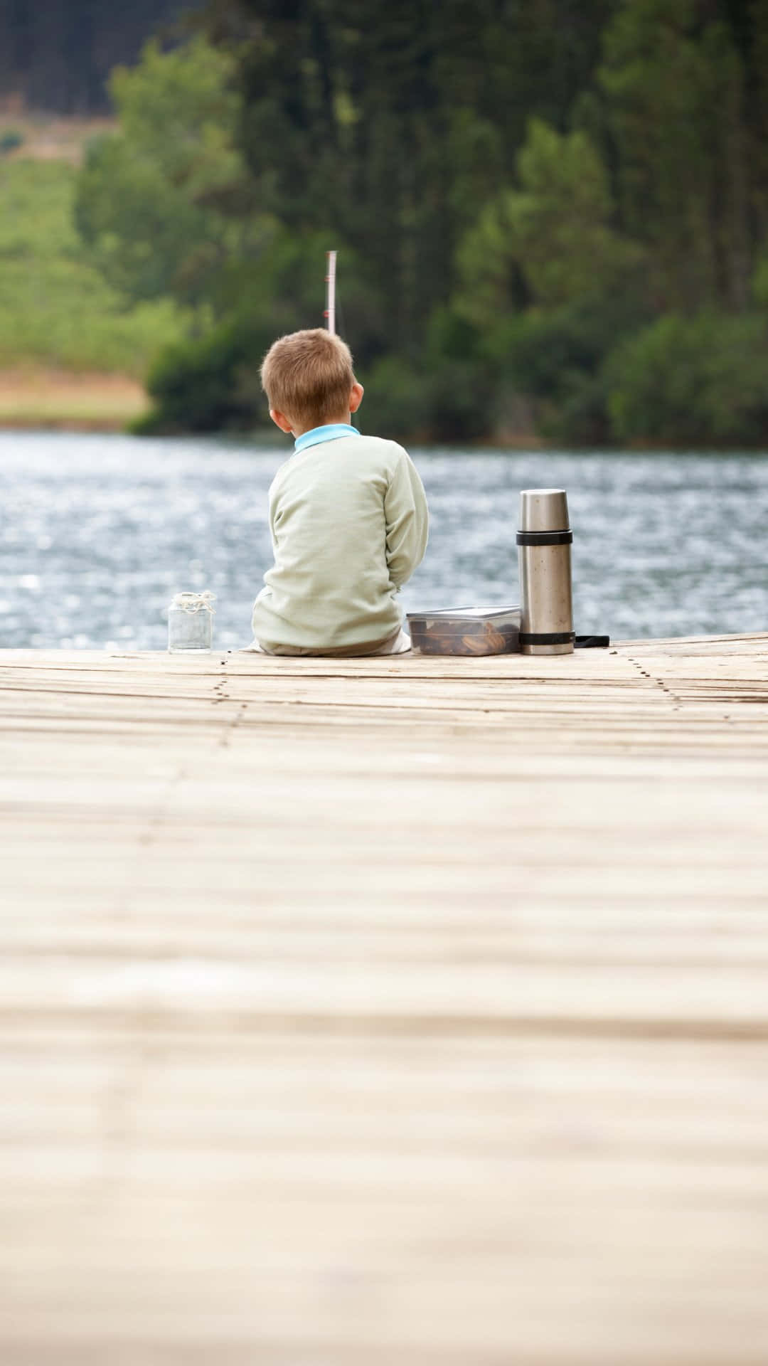 Lakeside Contemplation Boy Wallpaper