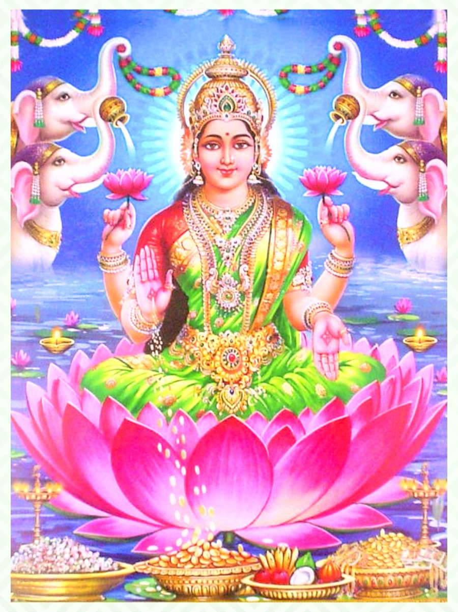 Download Lakshmi Devi With Four Elephants Wallpaper | Wallpapers.com
