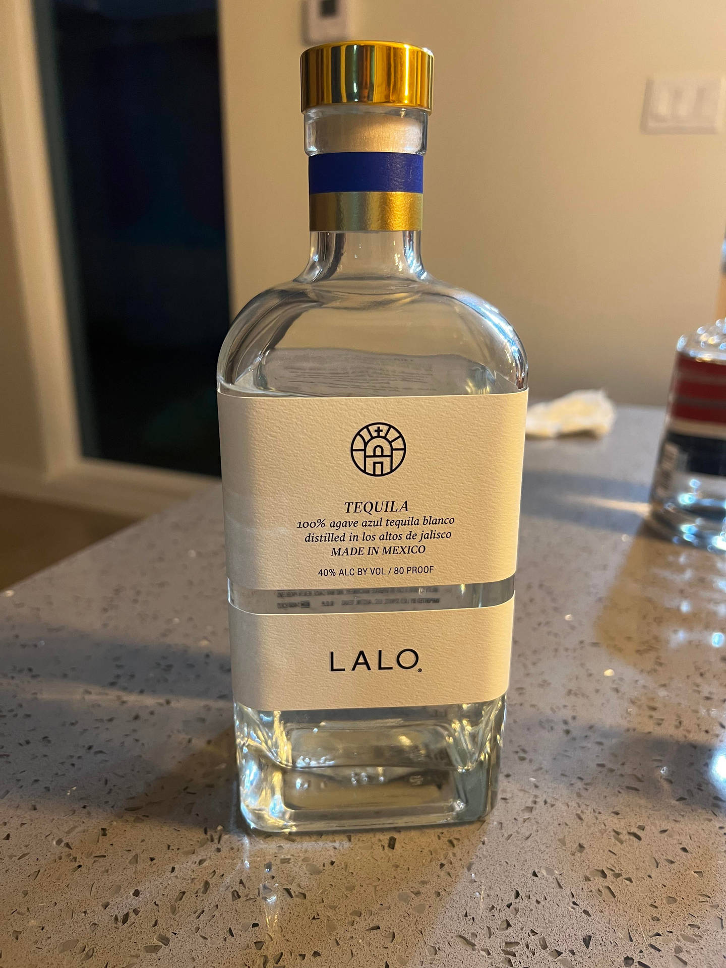 Lalo Tequila On Grey Countertop Wallpaper