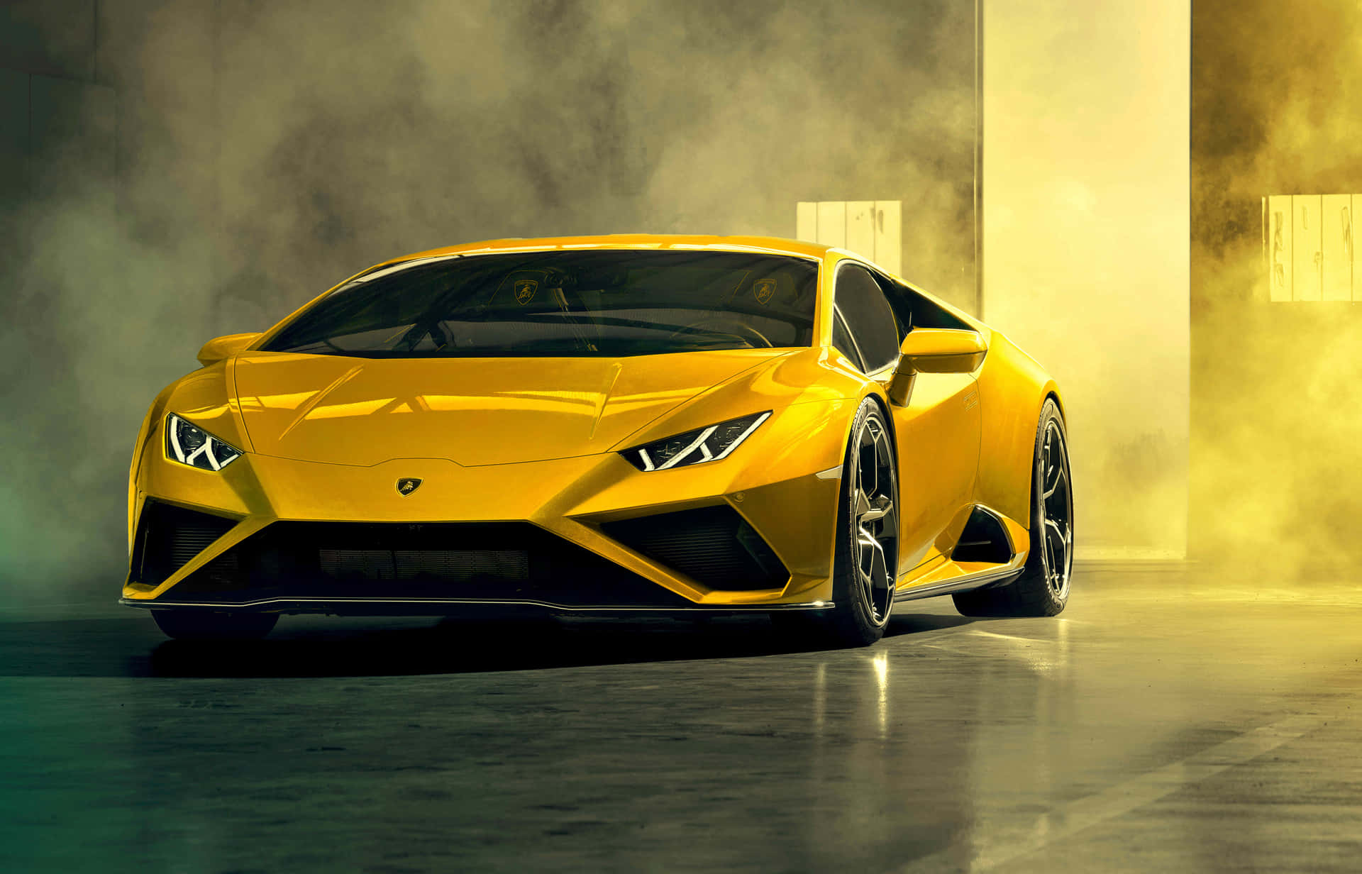 A Yellow Sports Car Is Driving Through A Smoke Filled Room