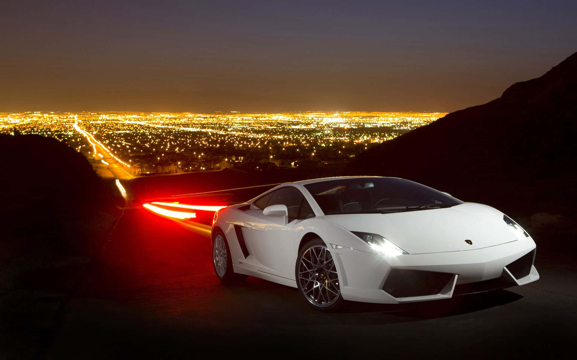 Sleek Lamborghini Gallardo Speeding on the Open Road Wallpaper