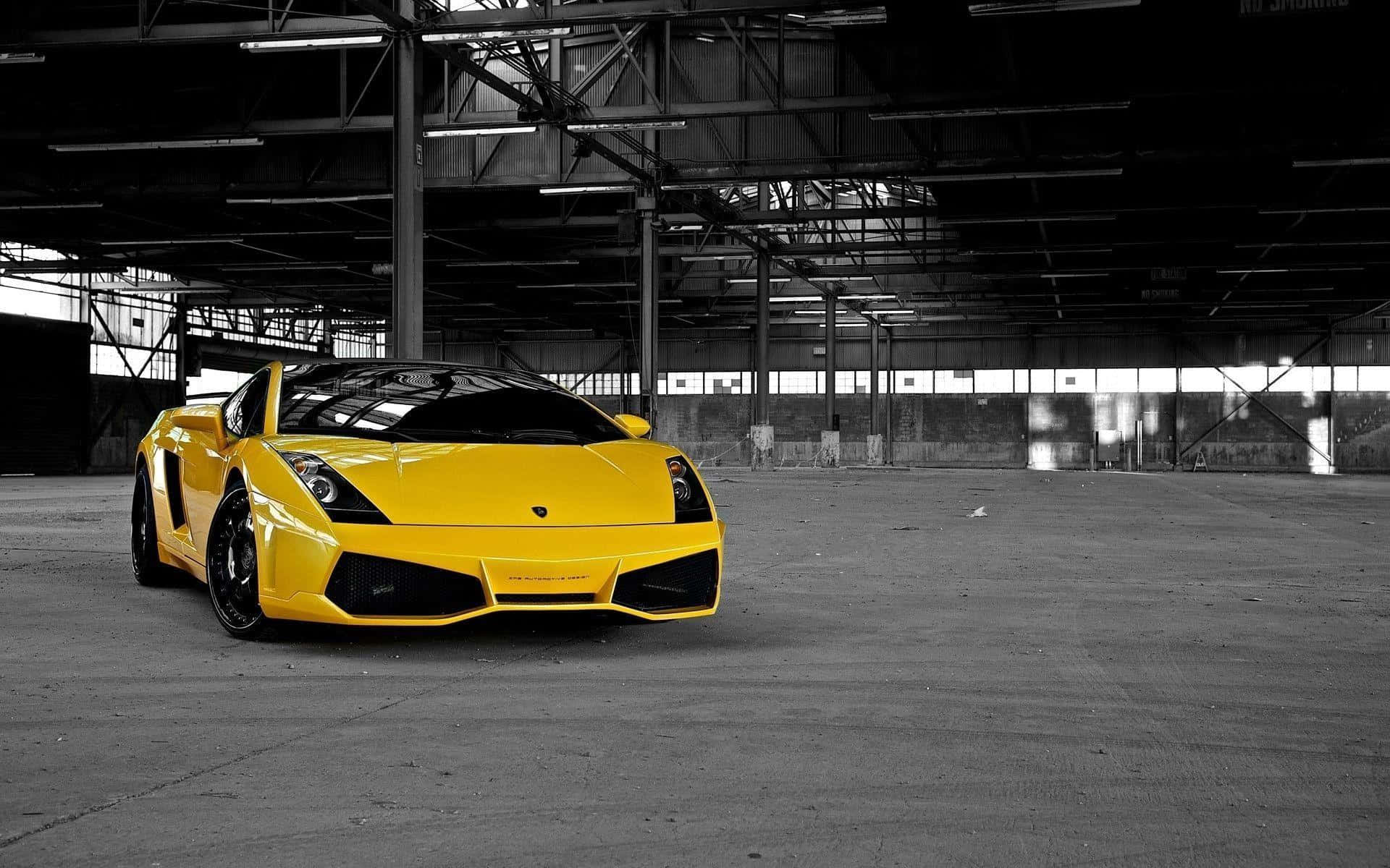 Sleek Lamborghini Gallardo on the Open Road Wallpaper