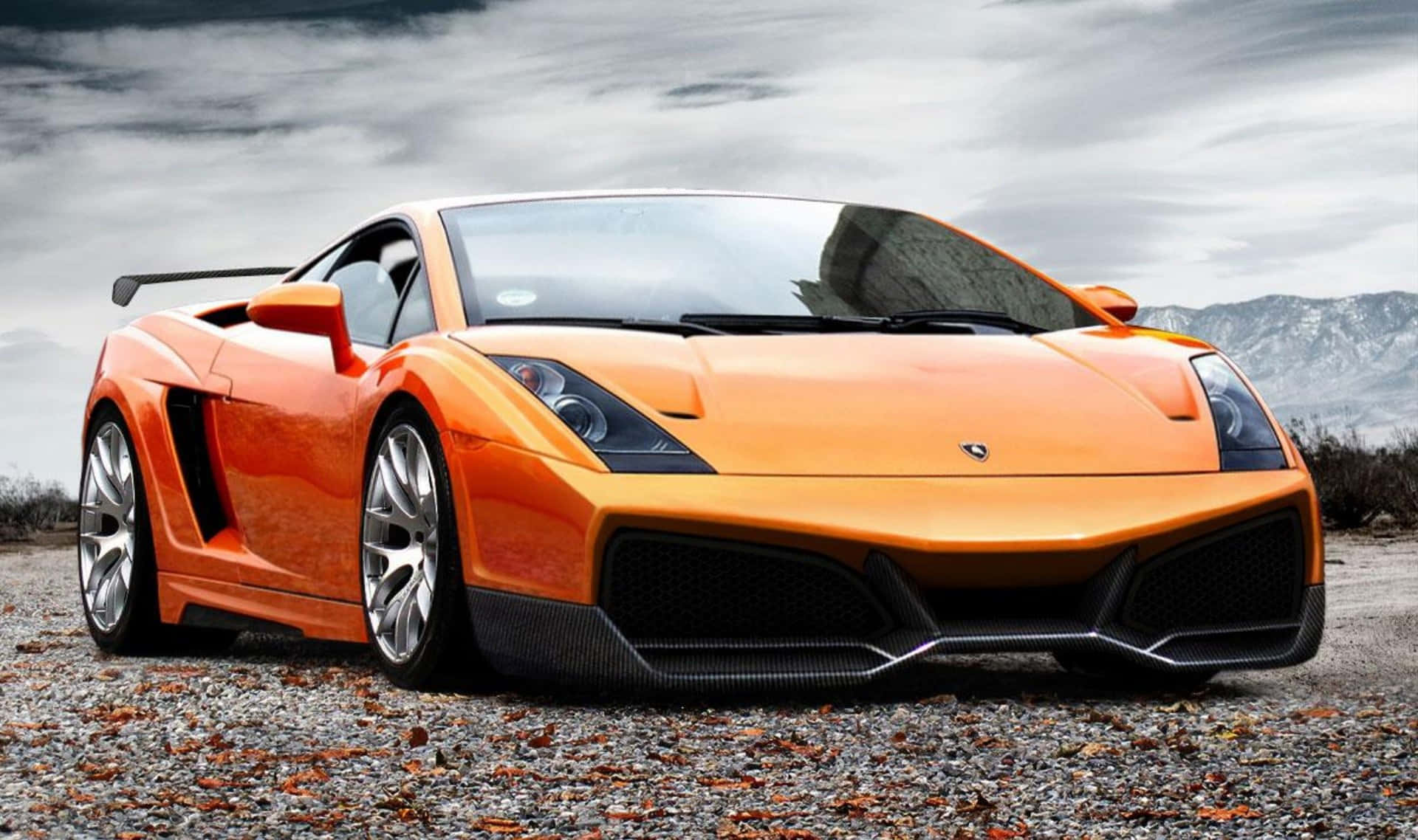Sporty Elegance - Lamborghini Gallardo on the Open Road Wallpaper