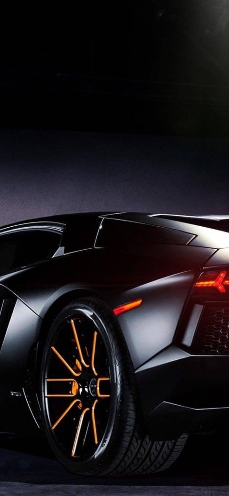 Lamborghiniiphone Schwarze Ästhetik Hinterreifen Wallpaper