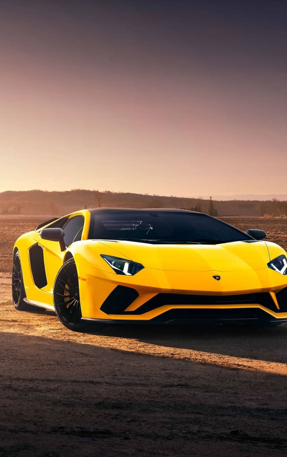 Lamborghiniiphone Amarillo Estético En El Desierto Fondo de pantalla