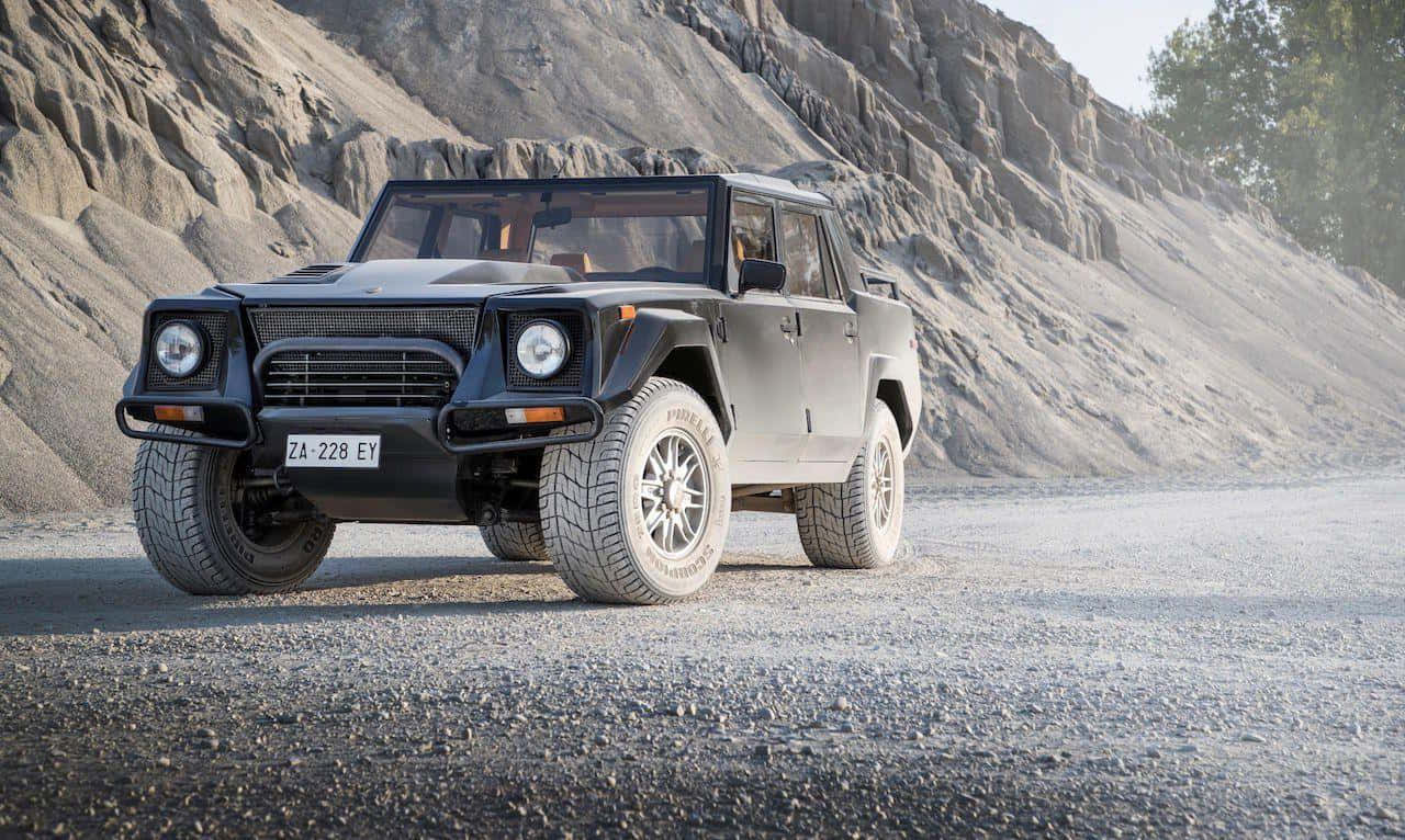 A Stunning Lamborghini LM002 SUV in Action Wallpaper