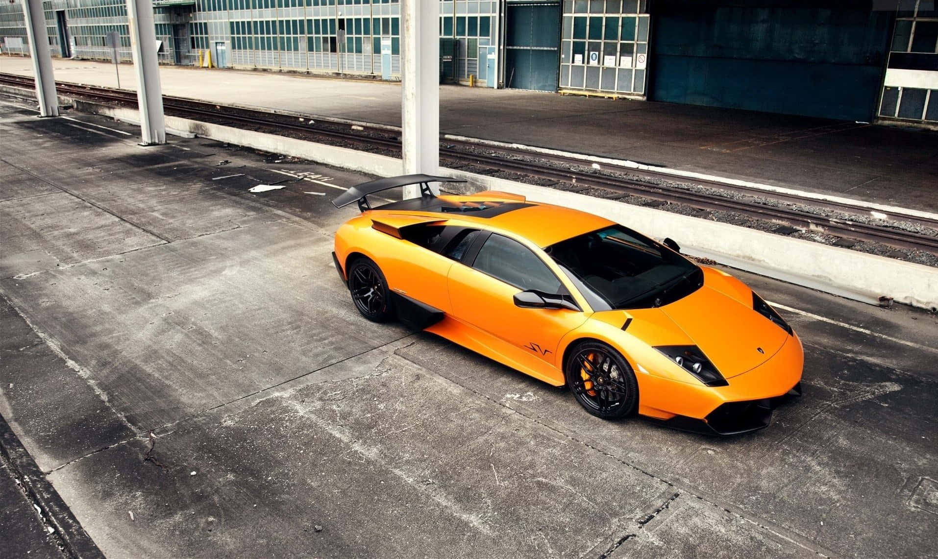 A Stunning Lamborghini Murciélago in Action on the Road Wallpaper