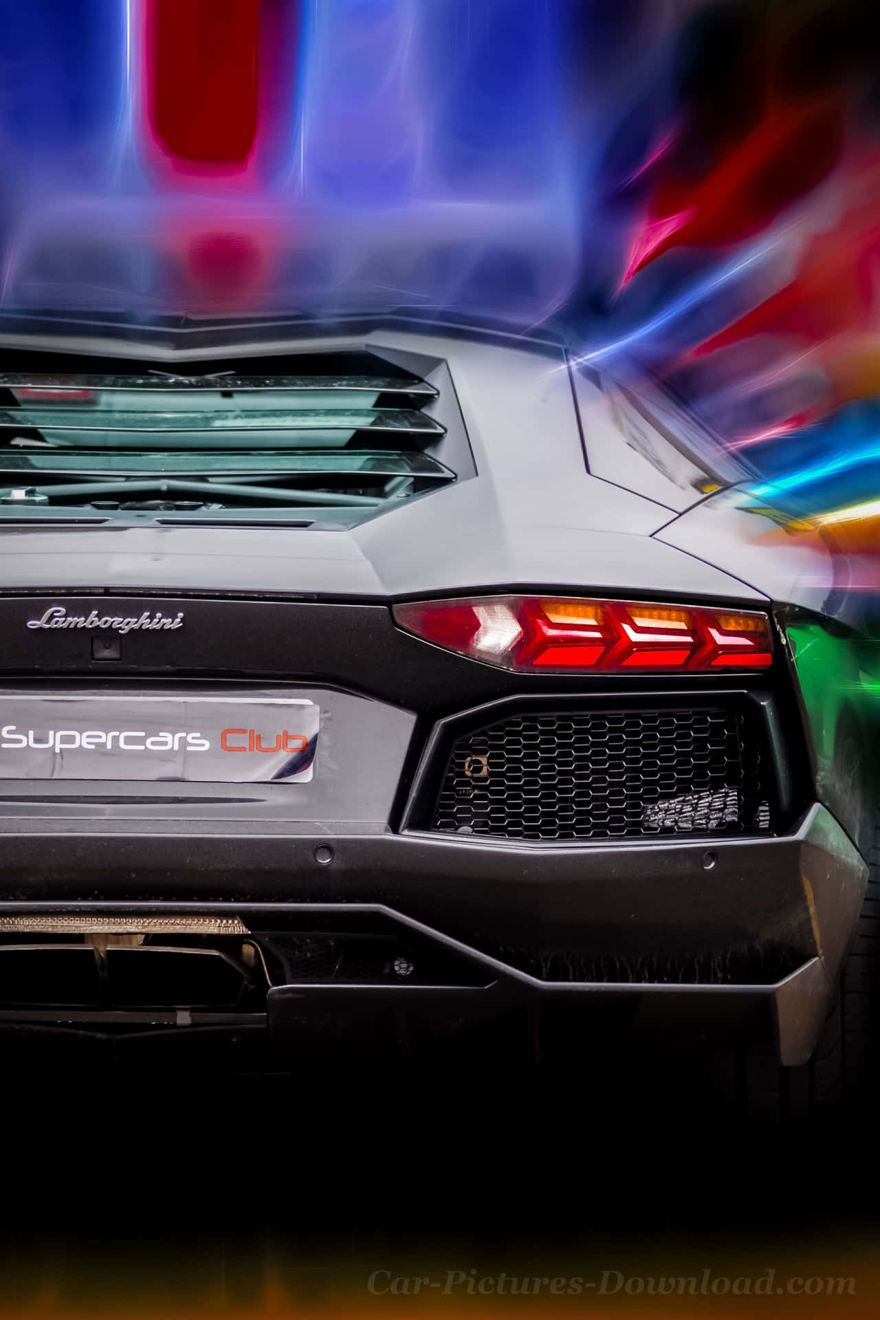 A Lamborghini Huracan In A Dark Night Scene Wallpaper