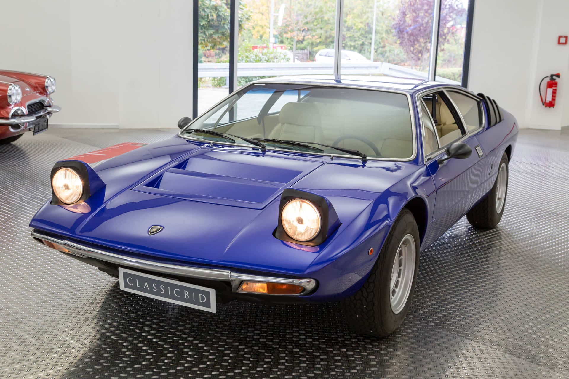 Stunning Lamborghini Urraco in motion on a winding road Wallpaper