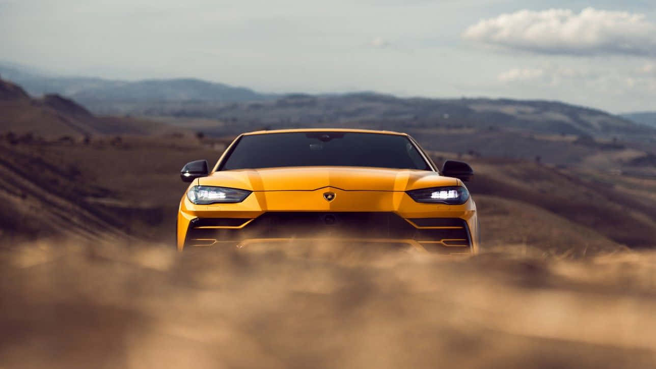 Caption: Power and Elegance Unleashed - Lamborghini Urus Wallpaper