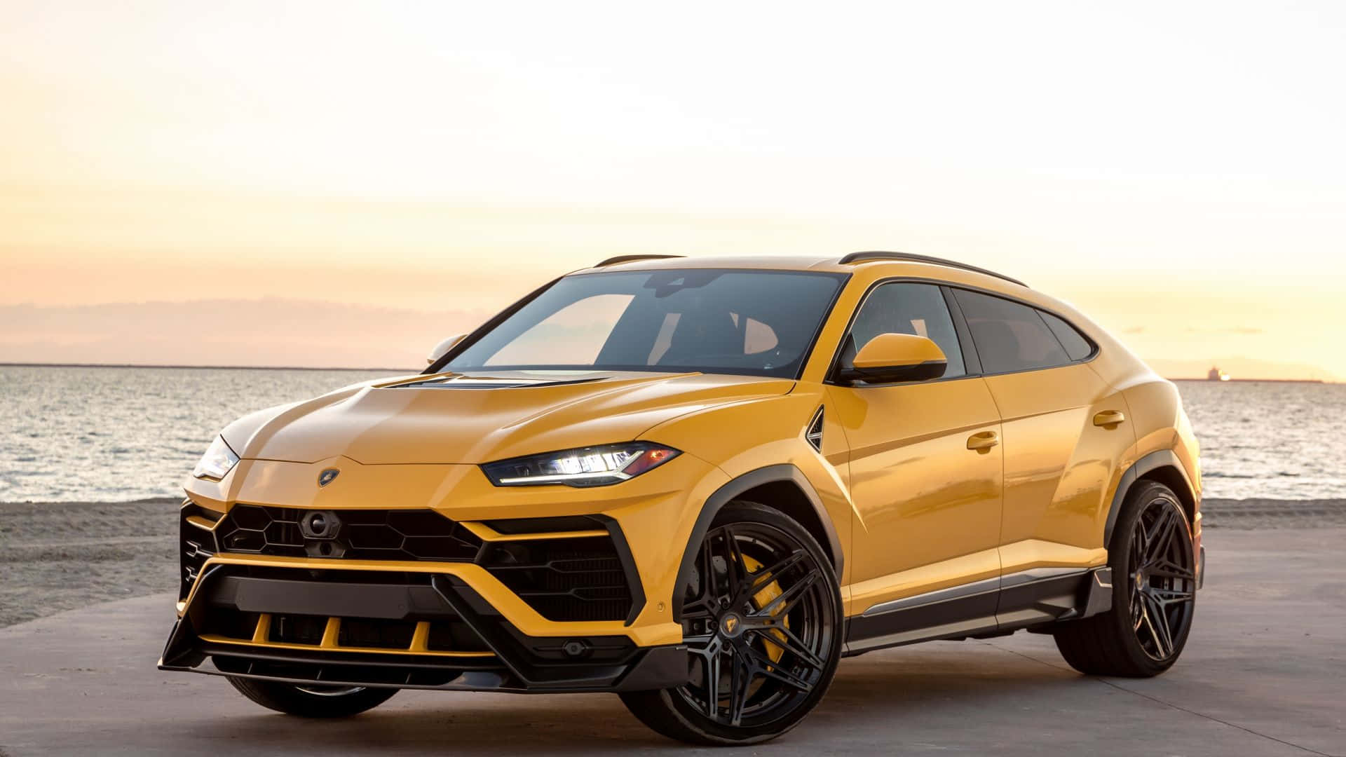 Download Sleek and Powerful Lamborghini Urus in Action Wallpaper ...