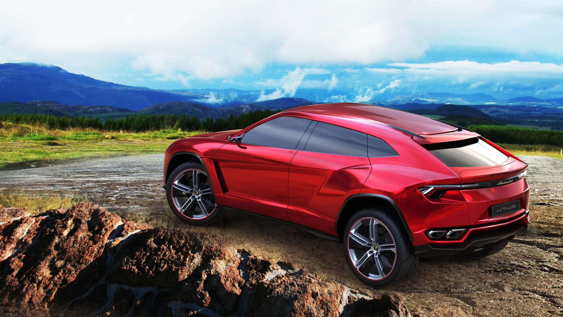 Sleek Lamborghini Urus luxury SUV in action Wallpaper