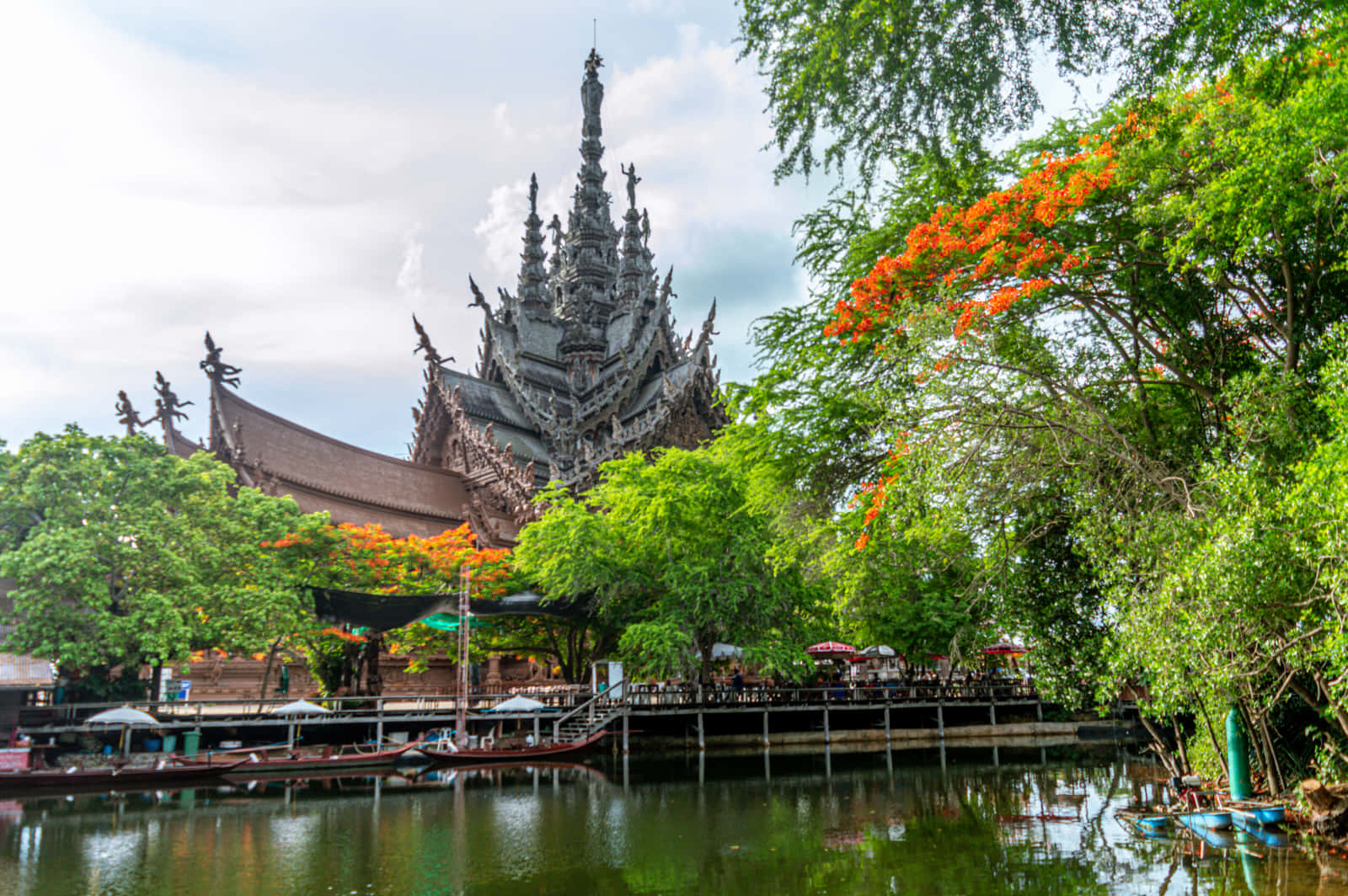 Landscape Surrounding The Sanctuary Of Truth In Thailand Wallpaper