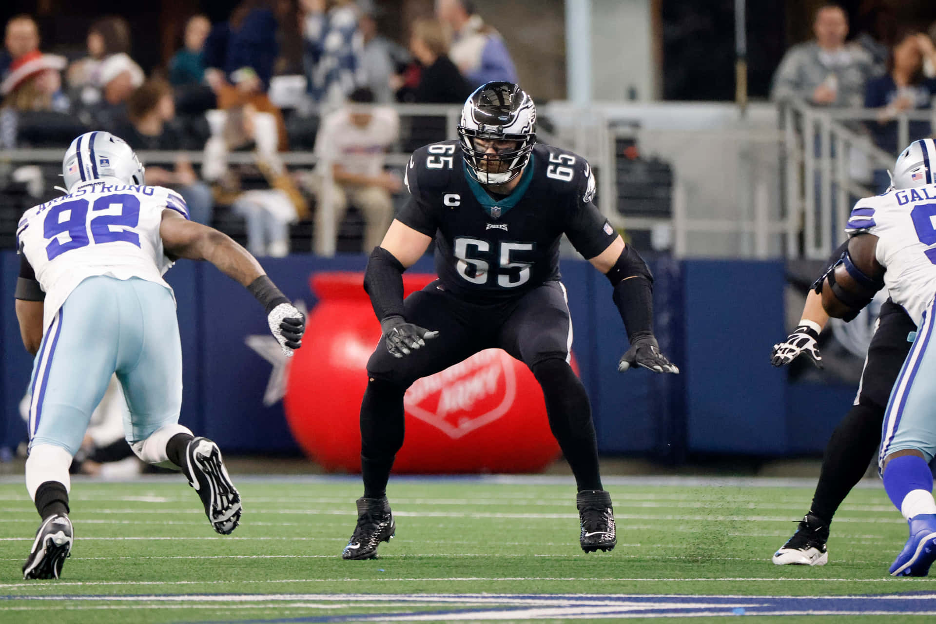 Lane Johnson Facing Defensive Opponents During Game Wallpaper