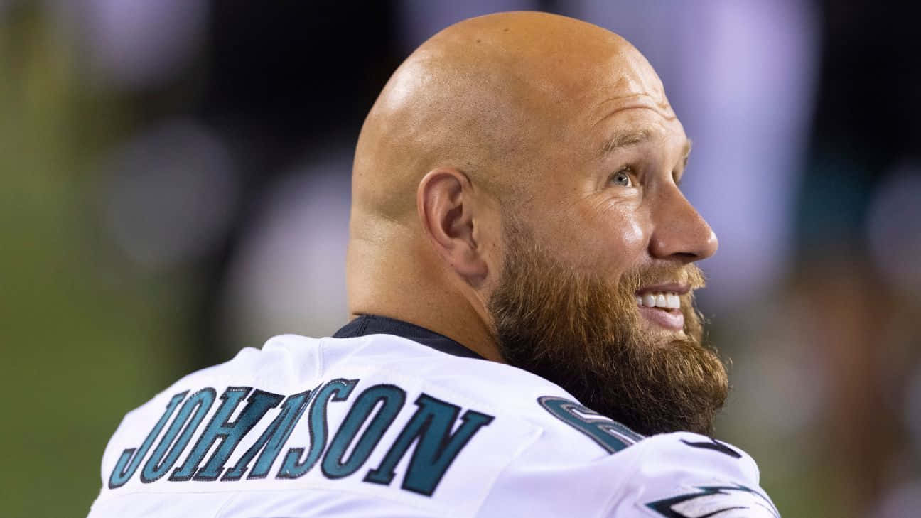 Download Lane Johnson Smilingin Football Uniform Wallpaper | Wallpapers.com