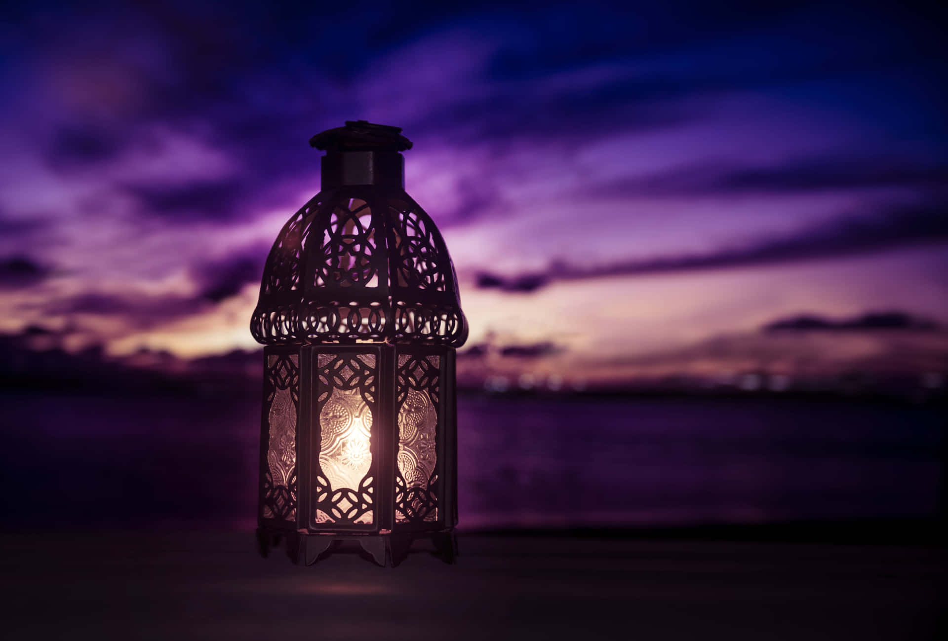 Glowing Lantern Under the Starry Sky